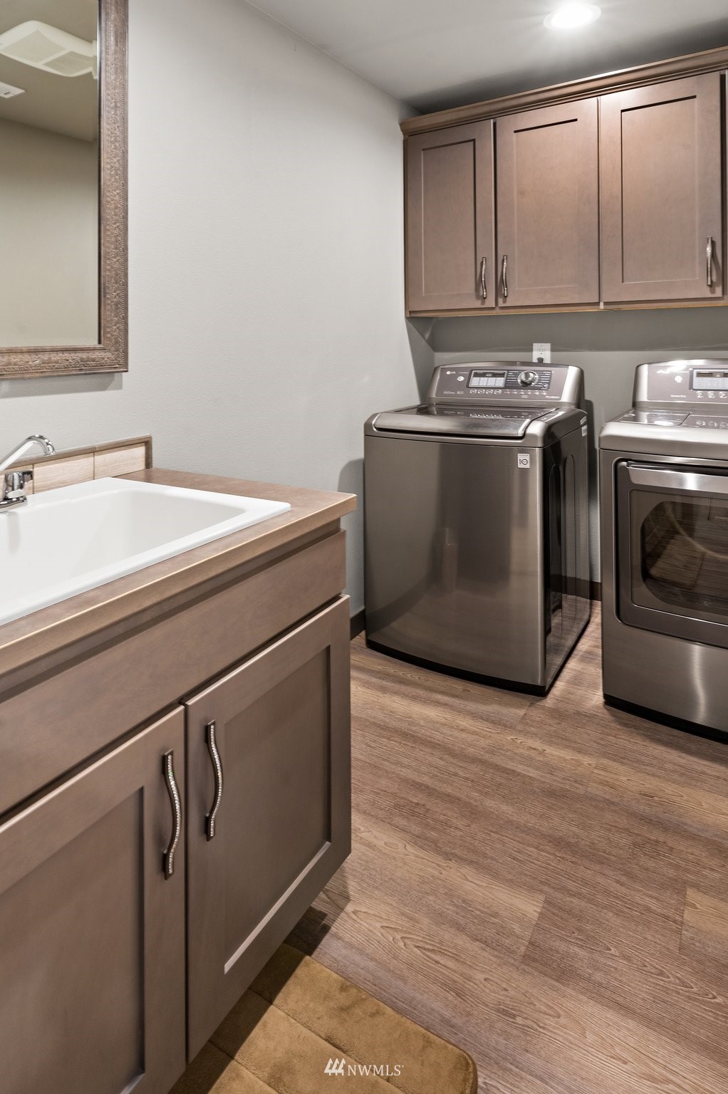 19129 43rd Avenue Southeast Bothell, WA 98012 - Photo 26 of 34 a utility room with washer and dryer