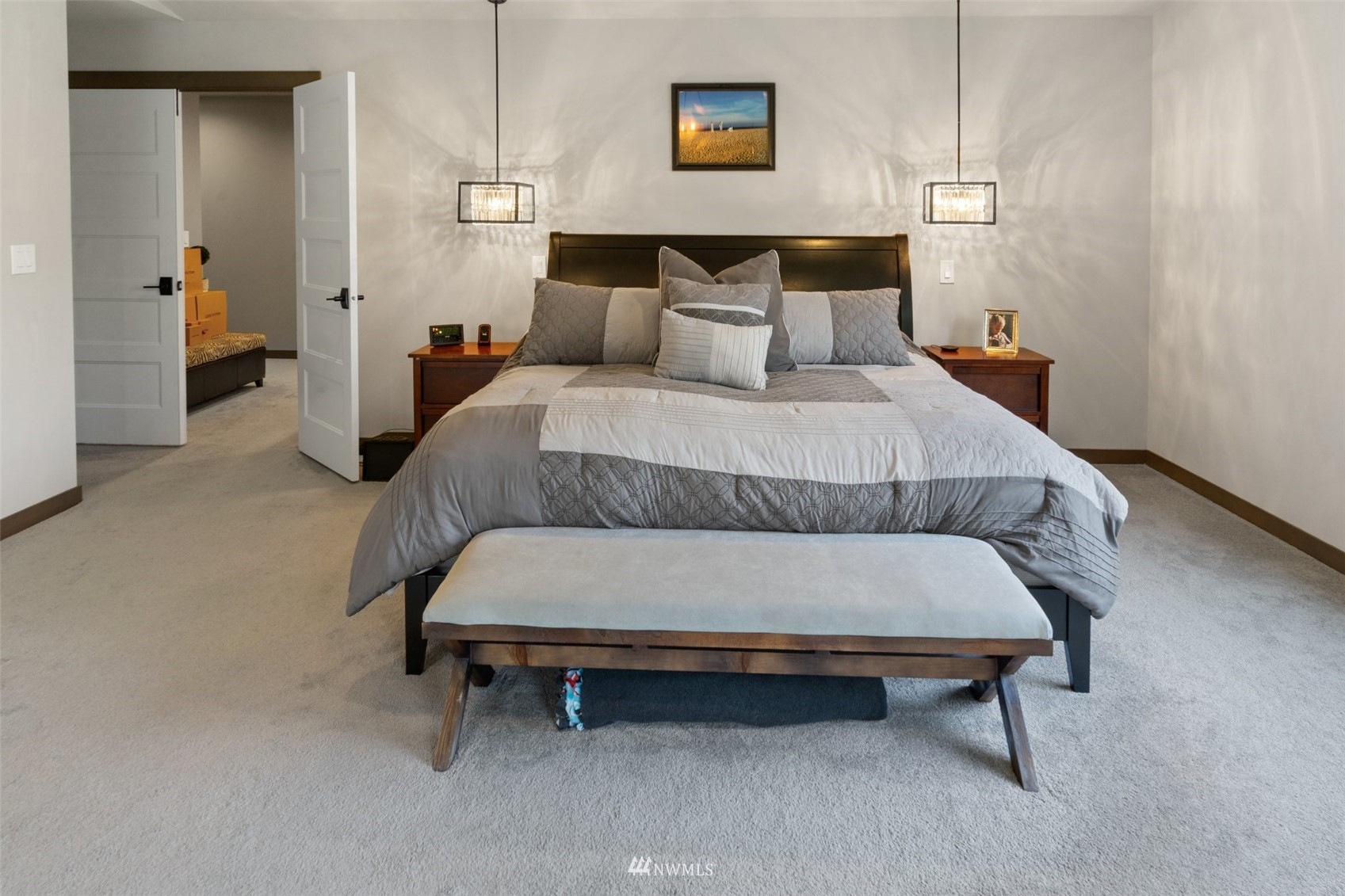 19129 43rd Avenue Southeast Bothell, WA 98012 - Photo 29 of 34 a bedroom with furniture and a lamp
