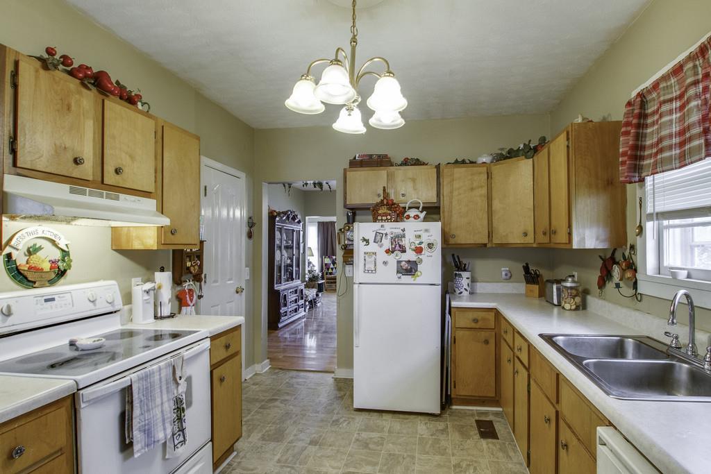 1708 South Main Street Springfield, TN 37172 - Photo 14 of 25 a kitchen filled a sink a stove and refrigerator