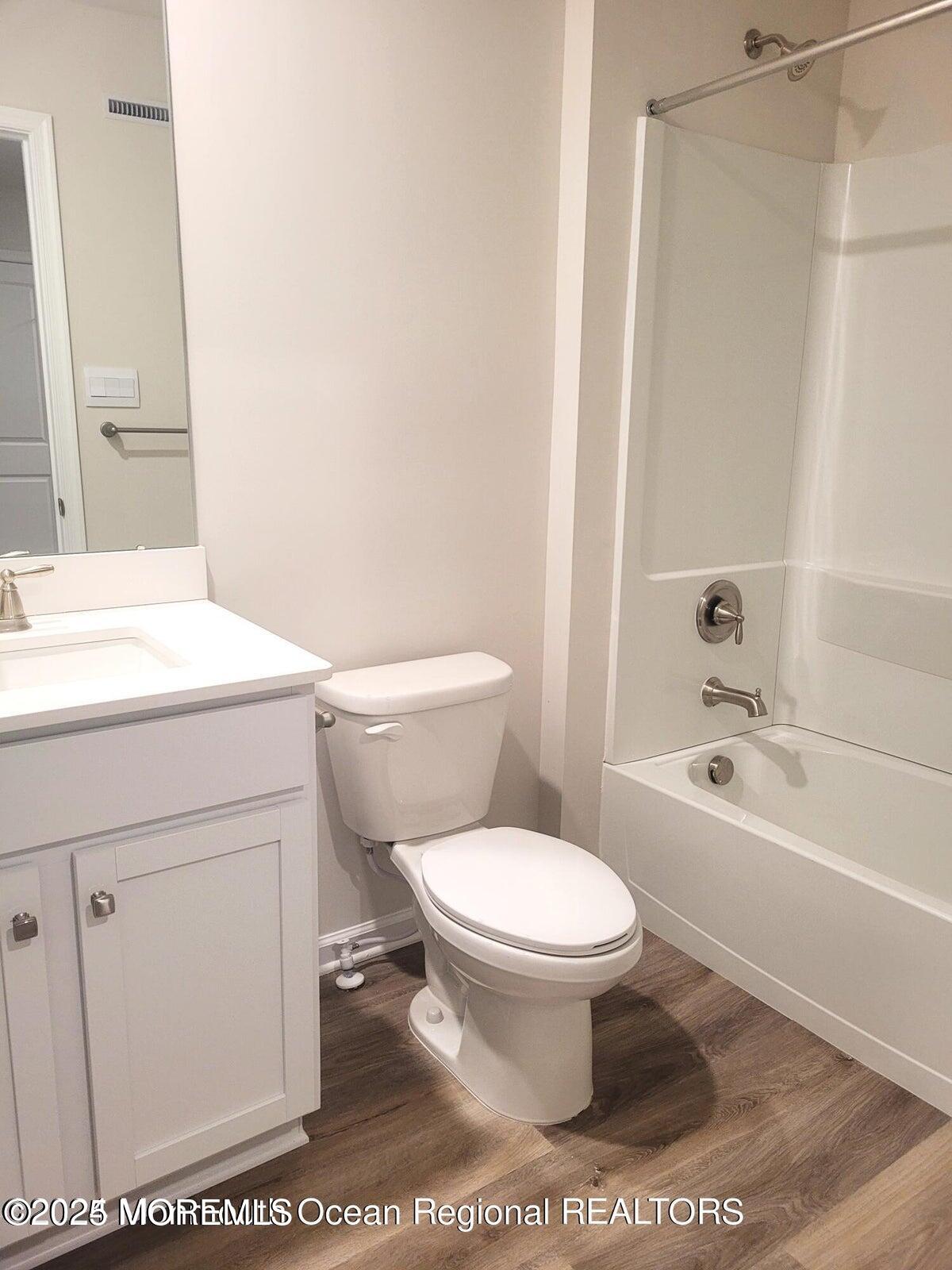 73 Nelsons Way Westampton, NJ 08060 - Photo 11 of 18 a bathroom with a toilet a sink and a bathtub