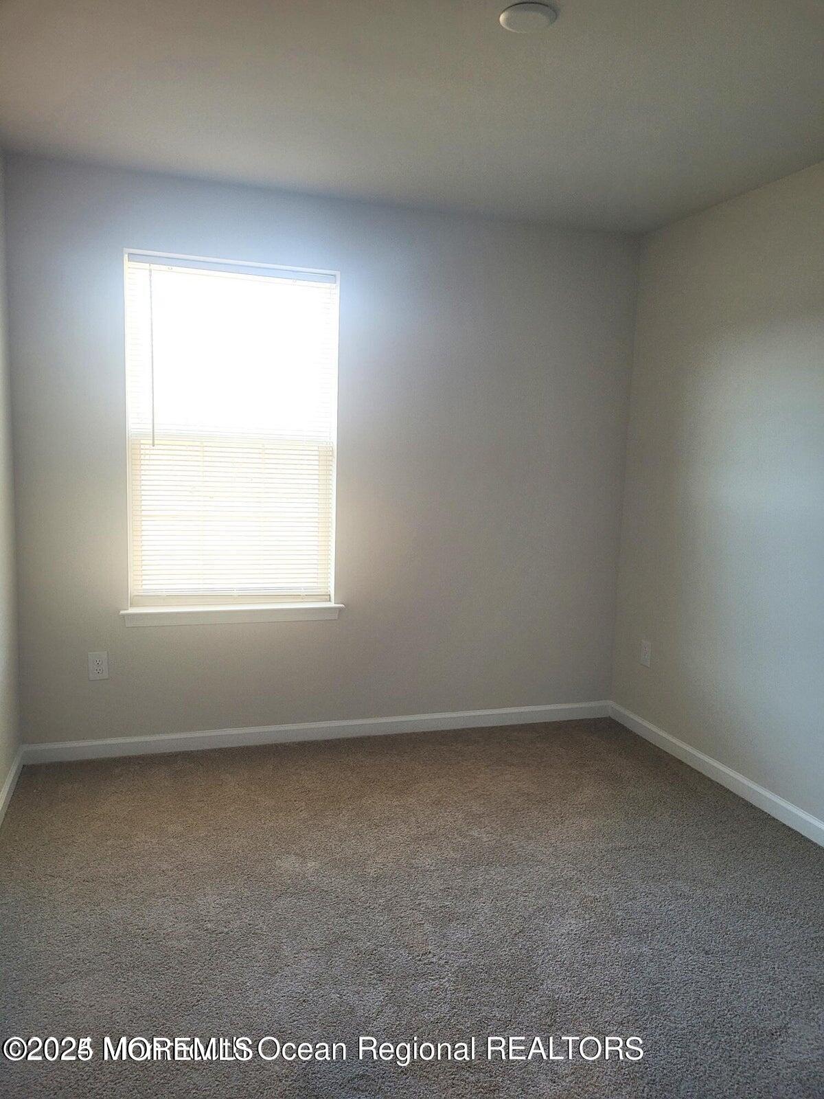 73 Nelsons Way Westampton, NJ 08060 - Photo 10 of 18 an empty room with a window