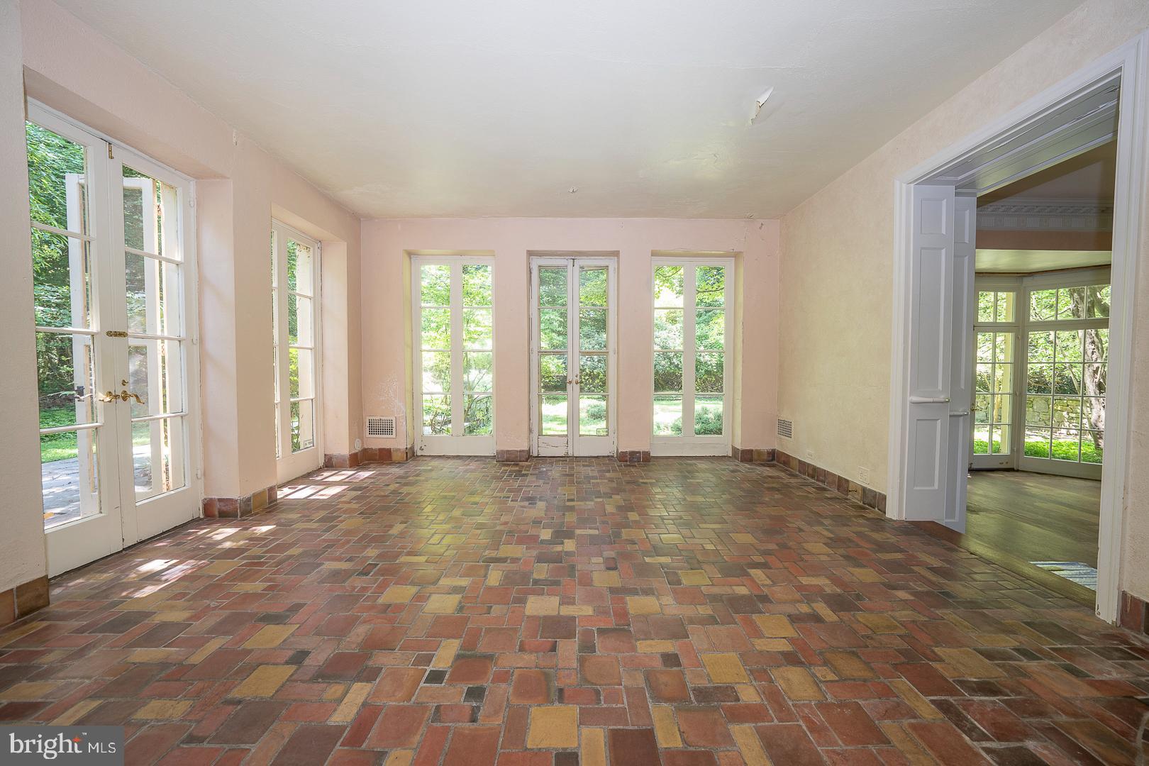 602 Old Eagle School Road Wayne, PA 19087 - Photo 30 of 100 Solarium opens to sunken formal garden