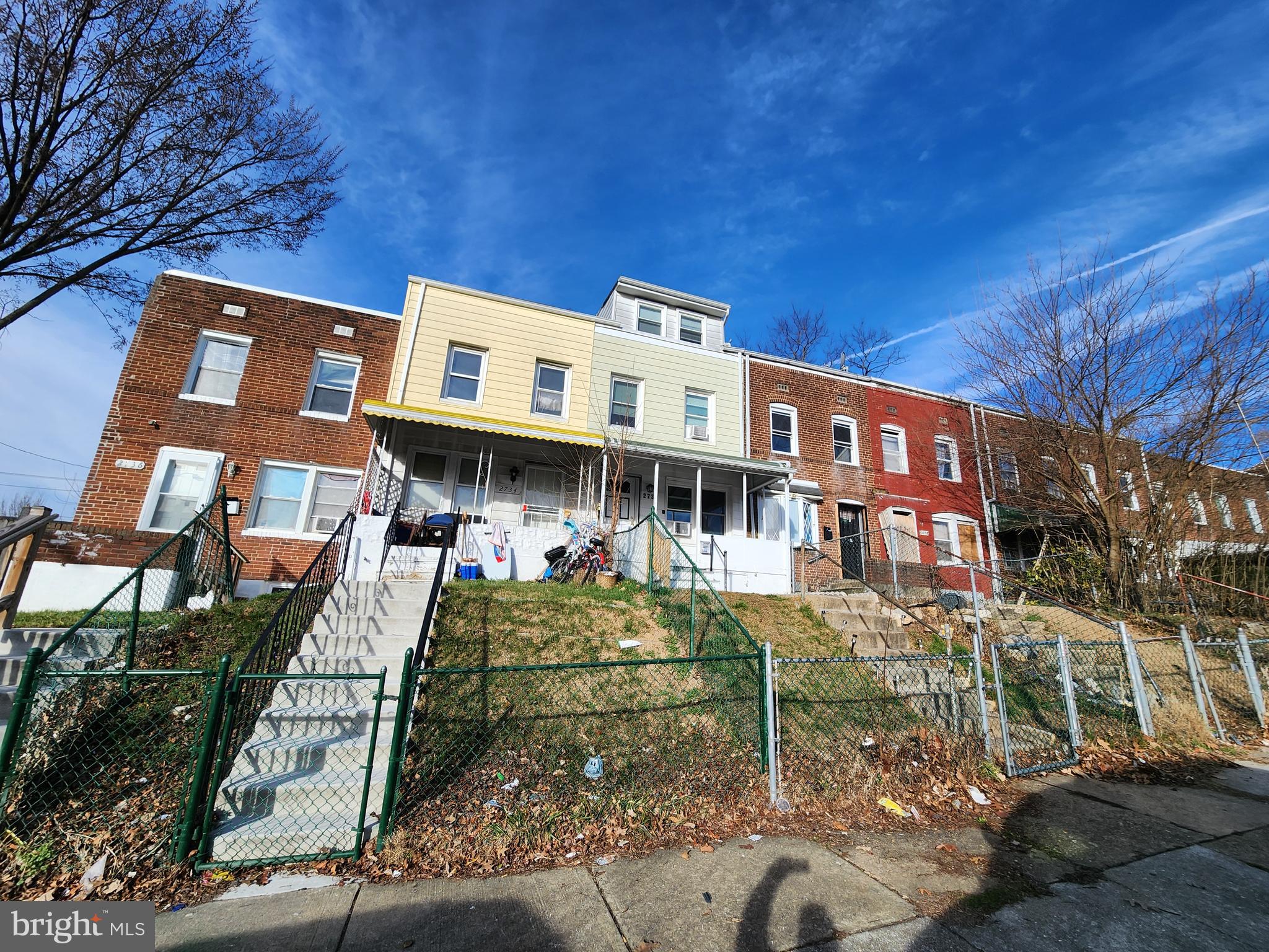 2734 Bookert Drive Baltimore, MD 21225 - Photo 3 of 3 a front view of a building with balcony