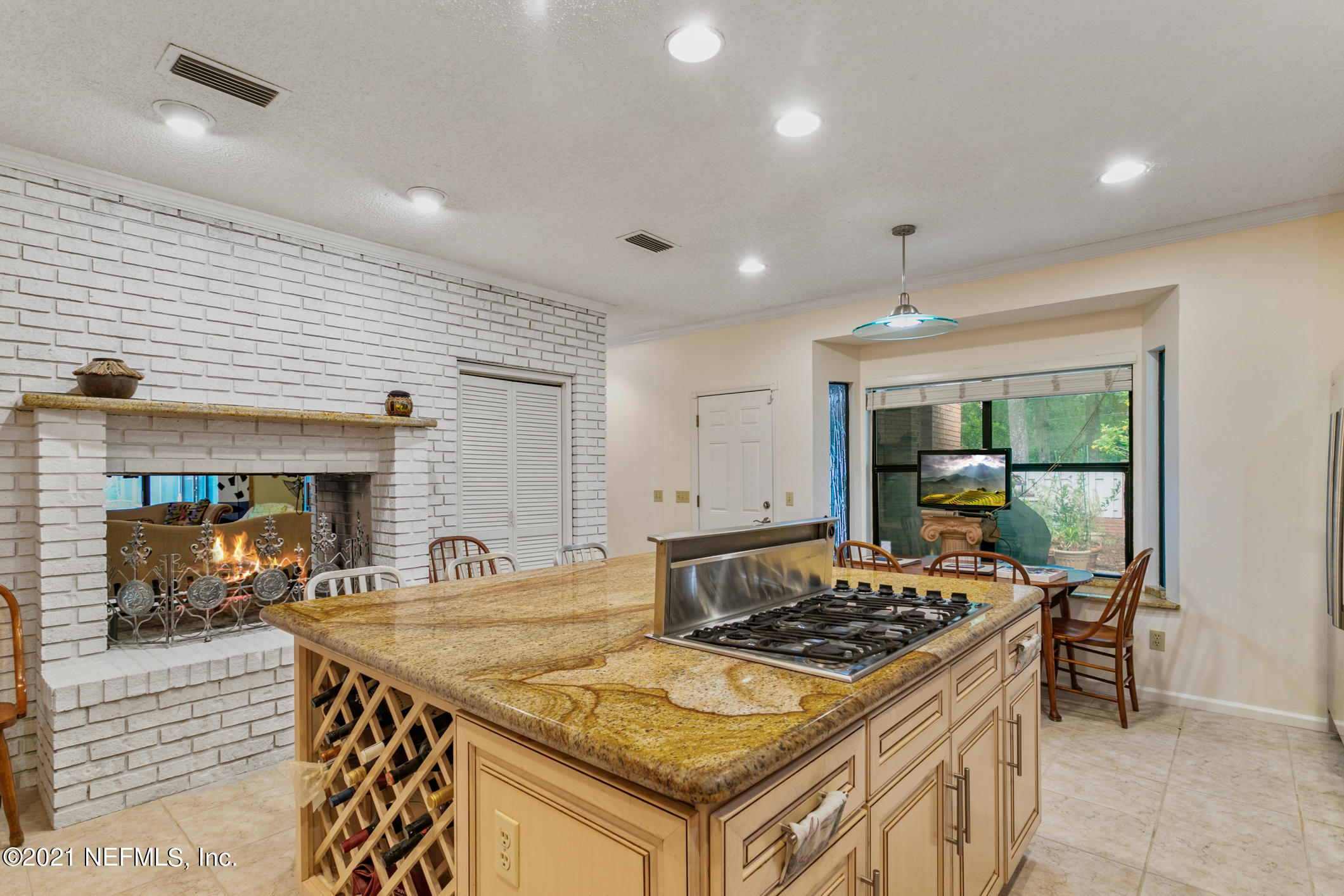 14140 Mandarin Road Jacksonville, FL 32223 - Photo 15 of 47 Kitchen with Fireplace