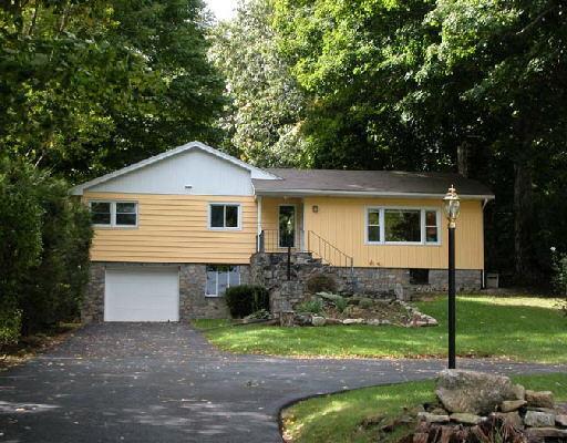 117 Ball Pond Road New Fairfield, CT 06812 - Photo 1 of 1 a front view of house with yard and green space