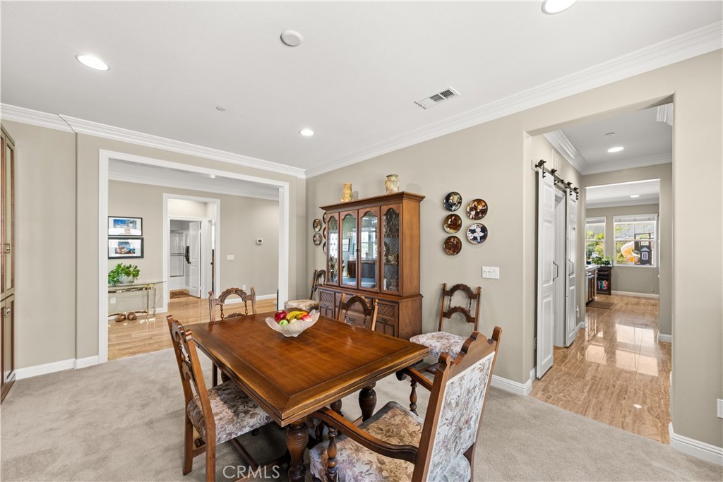4976 Golden Ridge Place Rancho Cucamonga, CA 91739 - Photo 11 of 56 From formal dining room you have access to laundry, garage, and kitchen