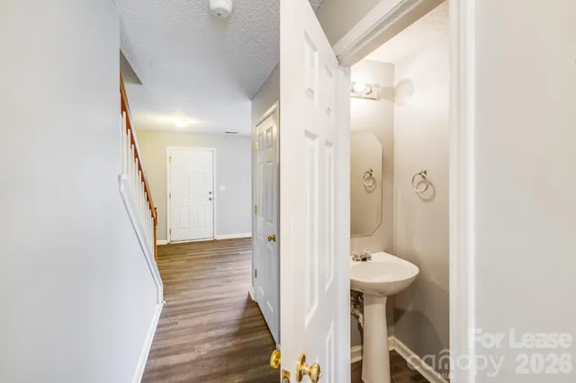 a bathroom with a sink and shower