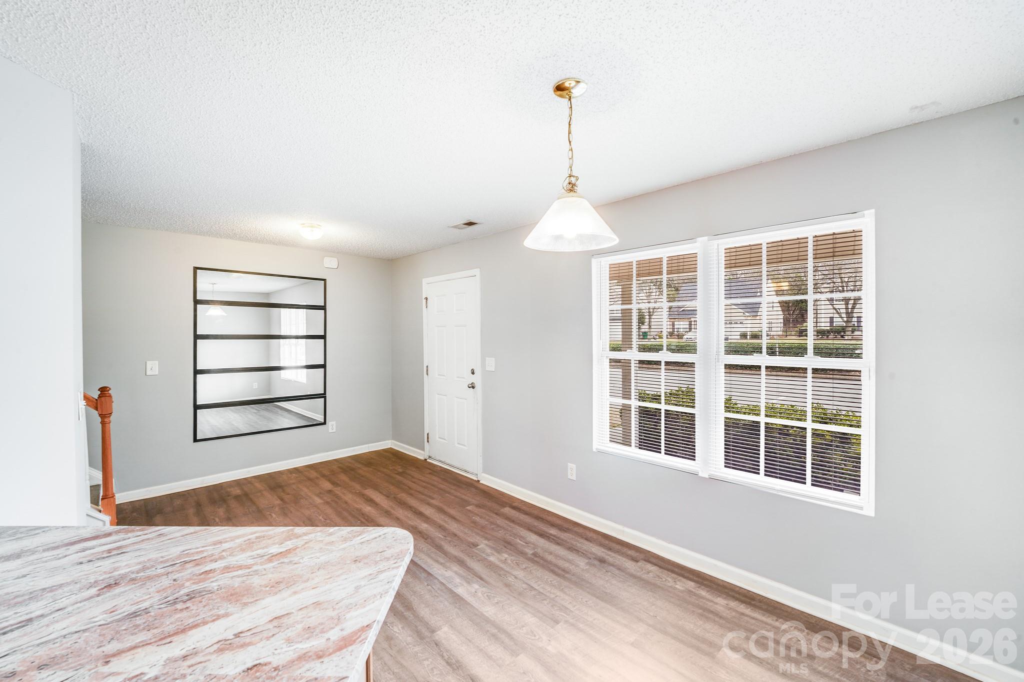 3260 Barons Court Road Charlotte, NC 28213 - Photo 7 of 25 a view of empty room with windows