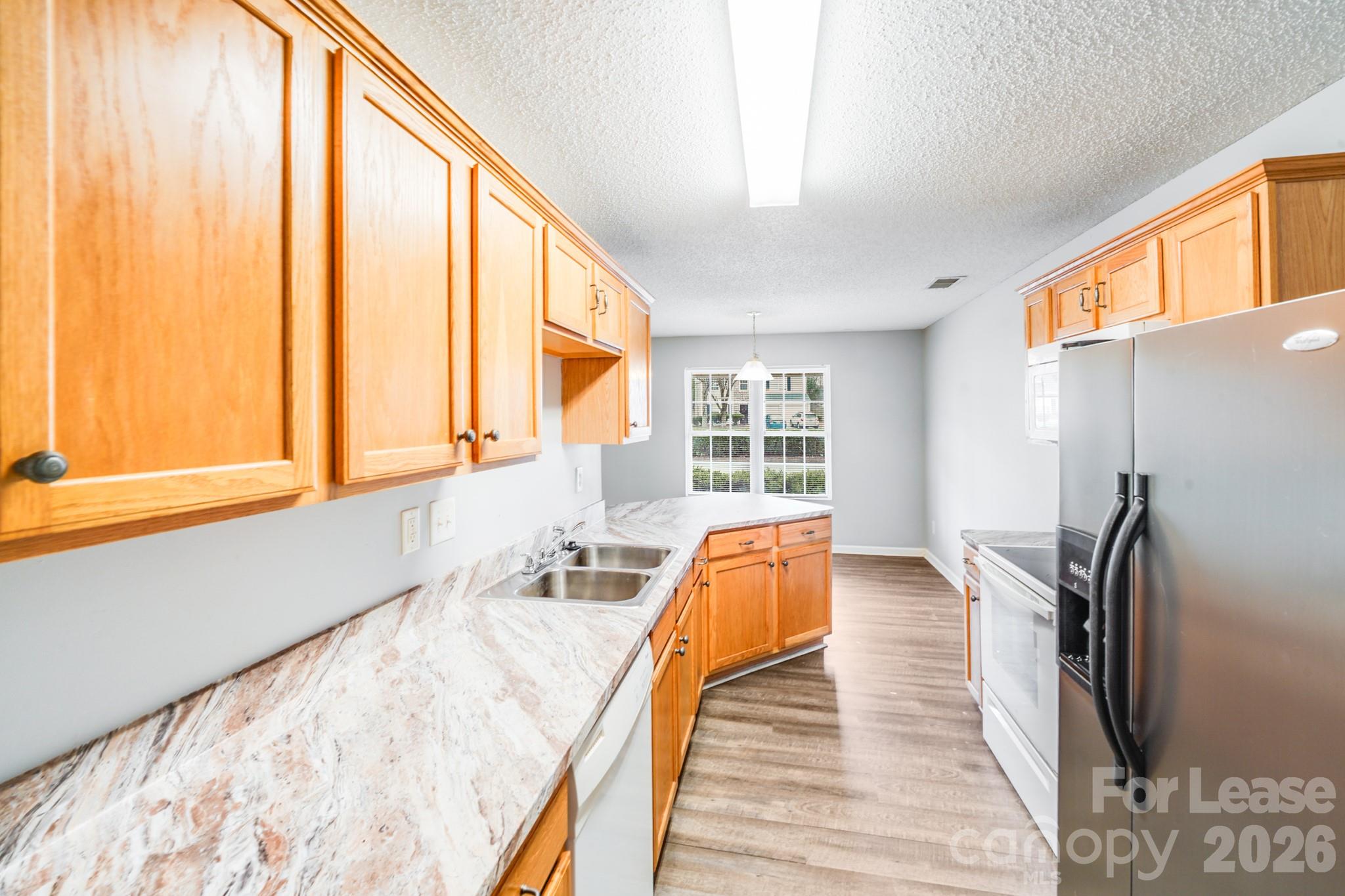 3260 Barons Court Road Charlotte, NC 28213 - Photo 9 of 25 a view of a living room with furniture and large windows