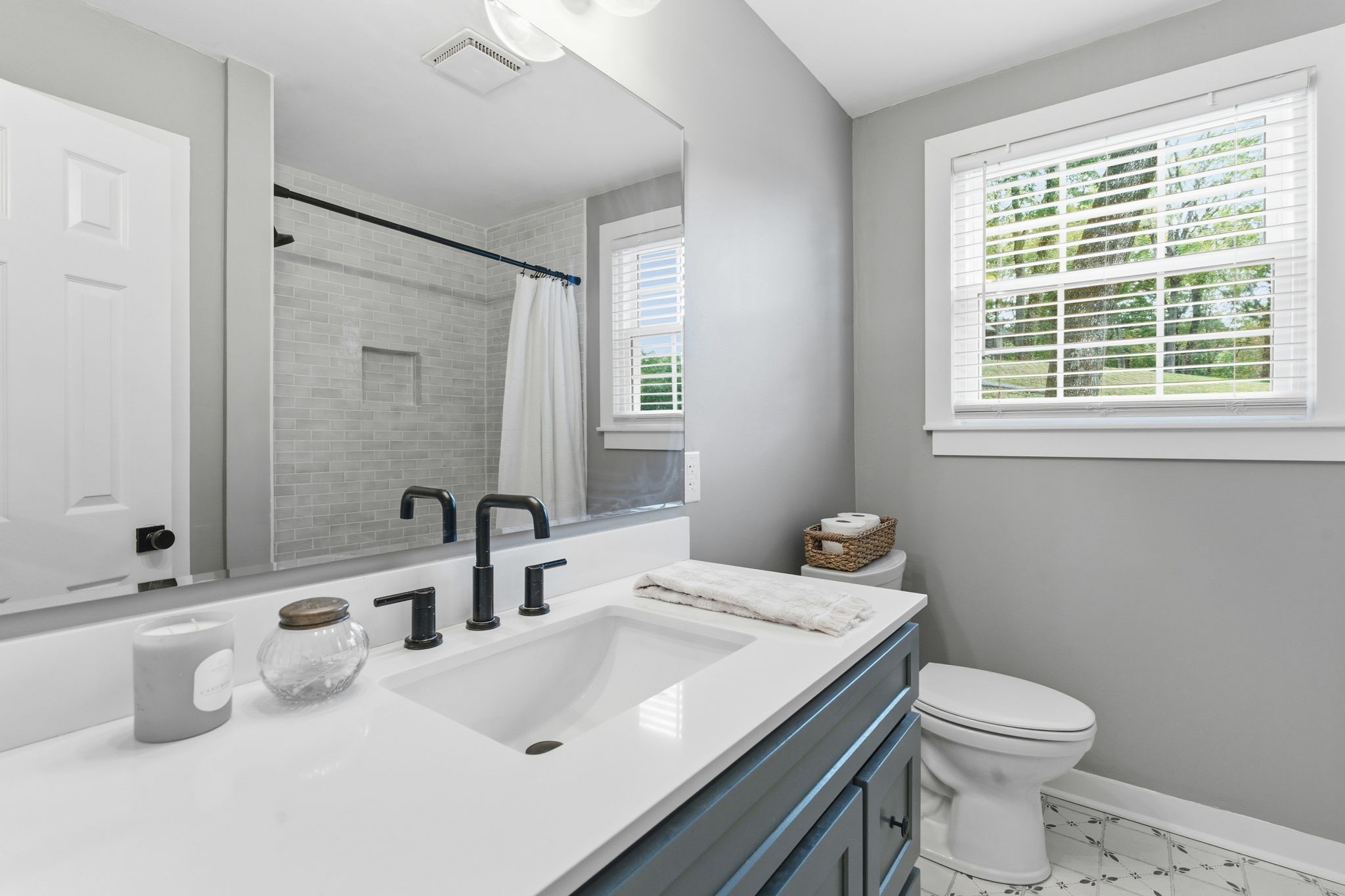 305 Ridgewood Road Franklin, TN 37064 - Photo 16 of 25 a bathroom with a sink toilet and window