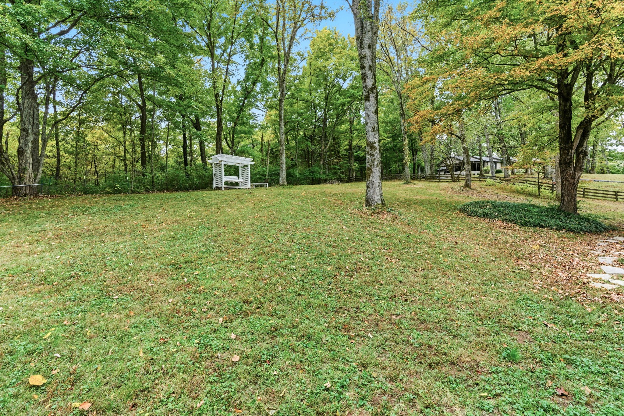 305 Ridgewood Road Franklin, TN 37064 - Photo 20 of 25 a house with lots of trees