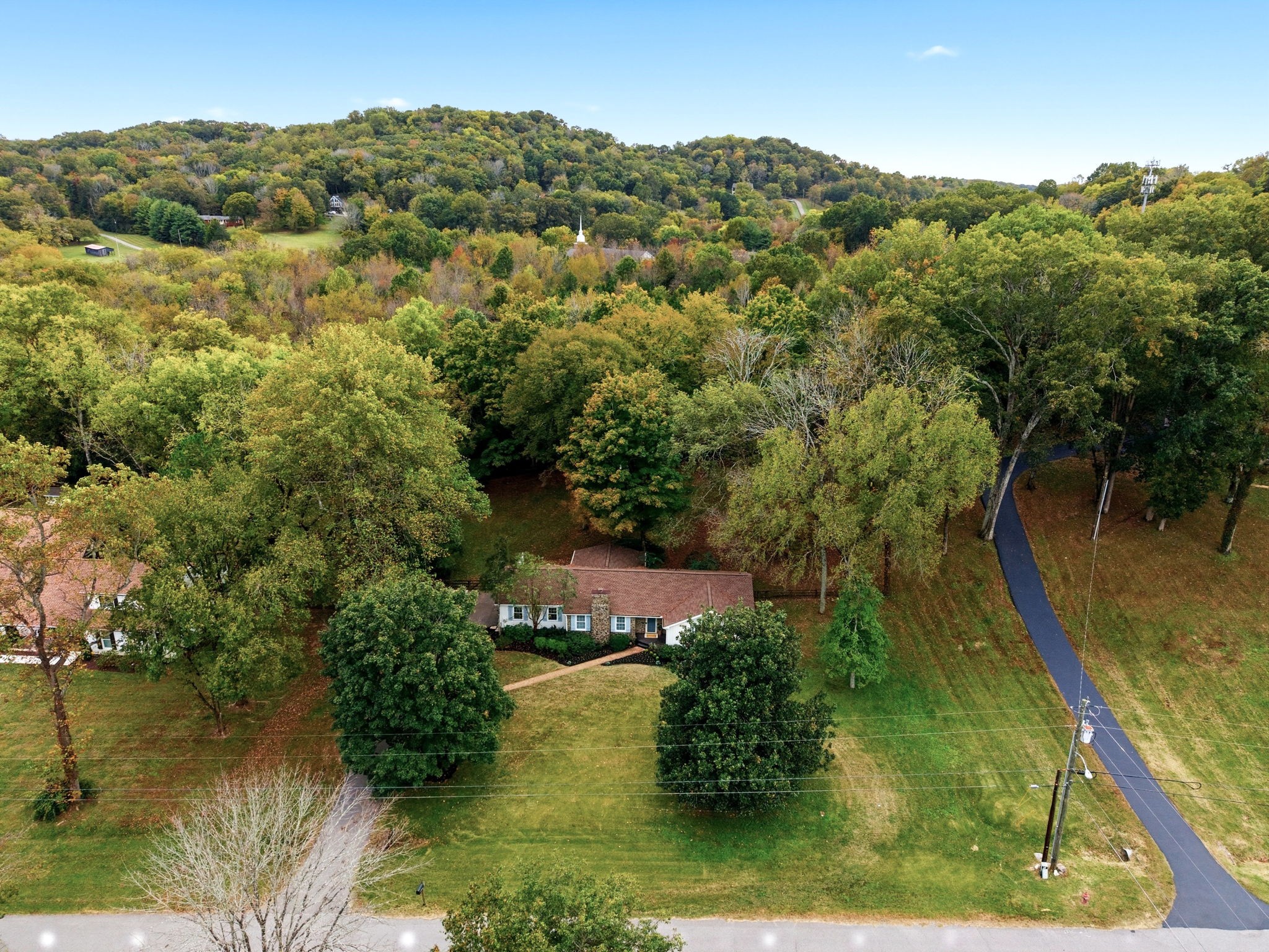305 Ridgewood Road Franklin, TN 37064 - Photo 22 of 25 an aerial view of residential houses with outdoor space and trees
