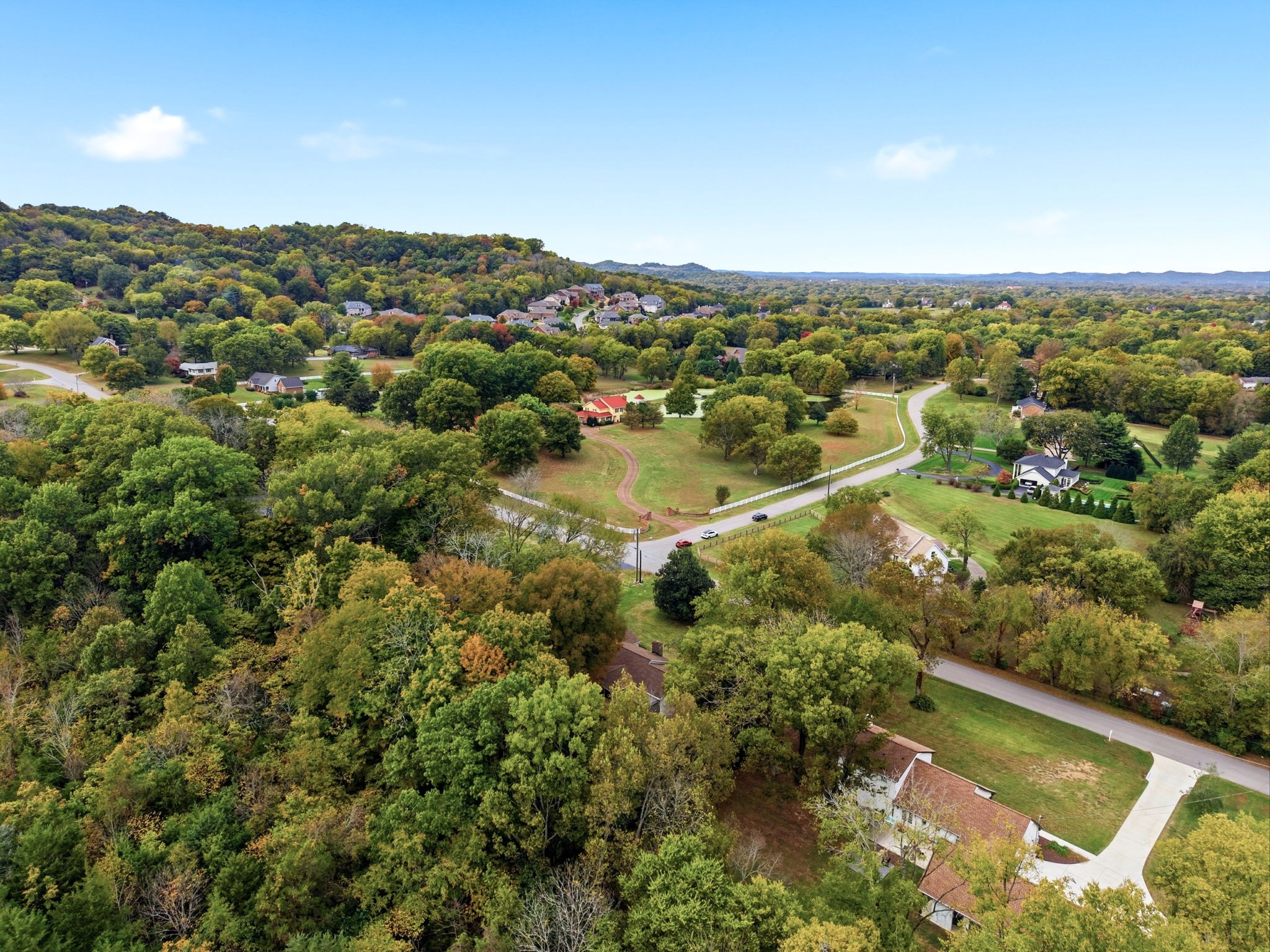 305 Ridgewood Road Franklin, TN 37064 - Photo 24 of 25 an aerial view of residential houses with outdoor space and trees