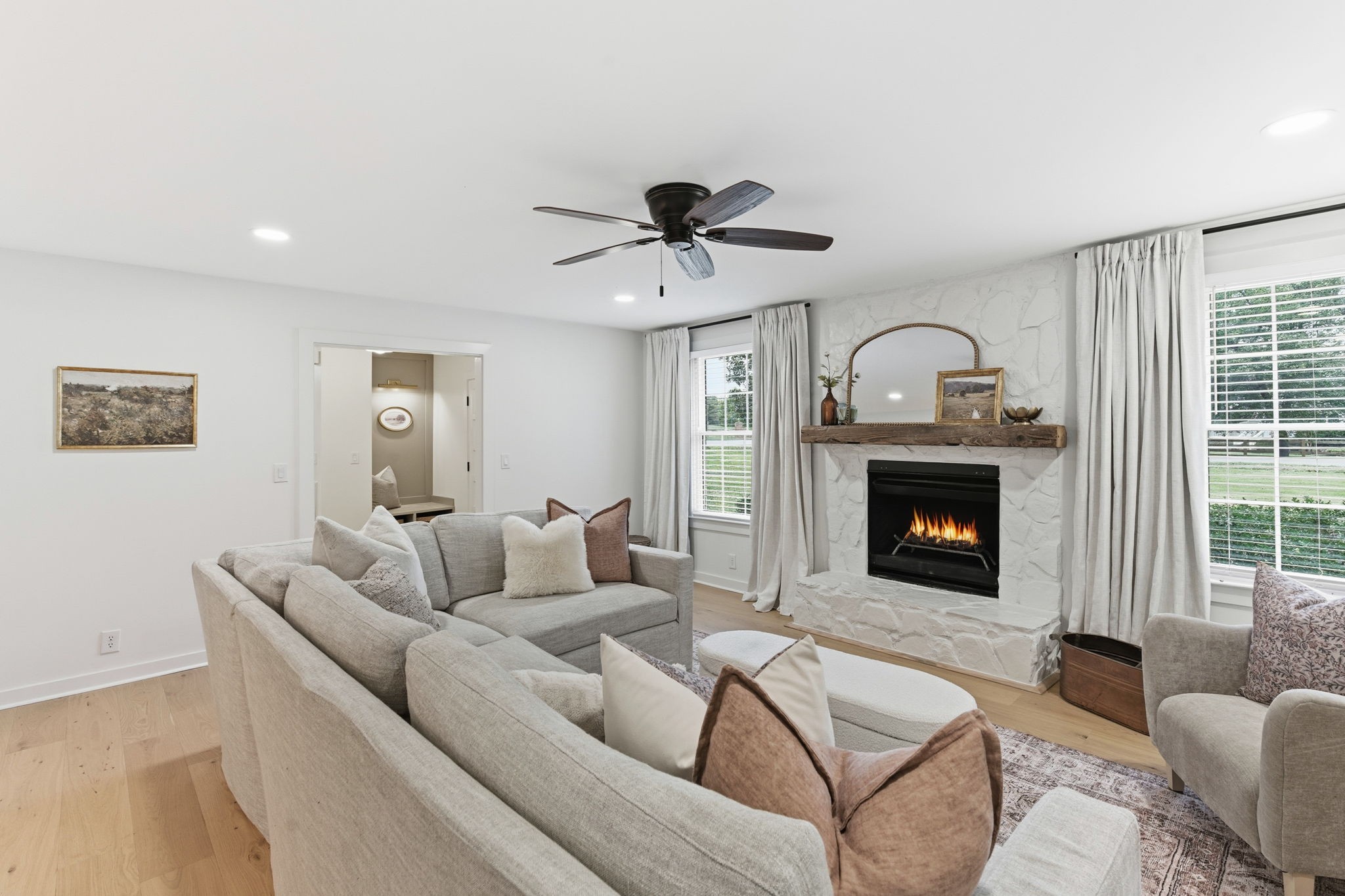 305 Ridgewood Road Franklin, TN 37064 - Photo 5 of 25 a living room with furniture and a fireplace