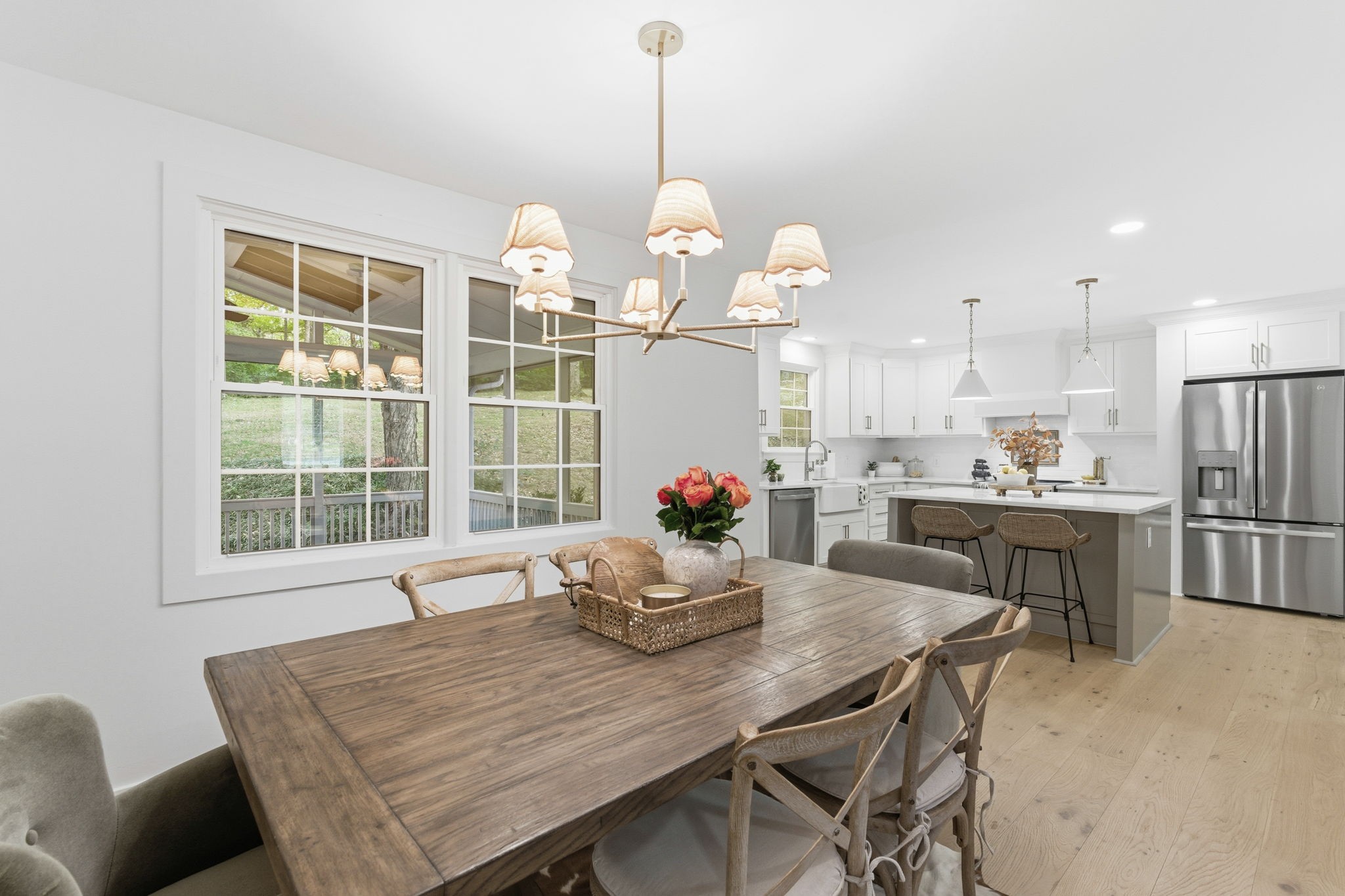 305 Ridgewood Road Franklin, TN 37064 - Photo 6 of 25 a dining room filled chandelier and kitchen view