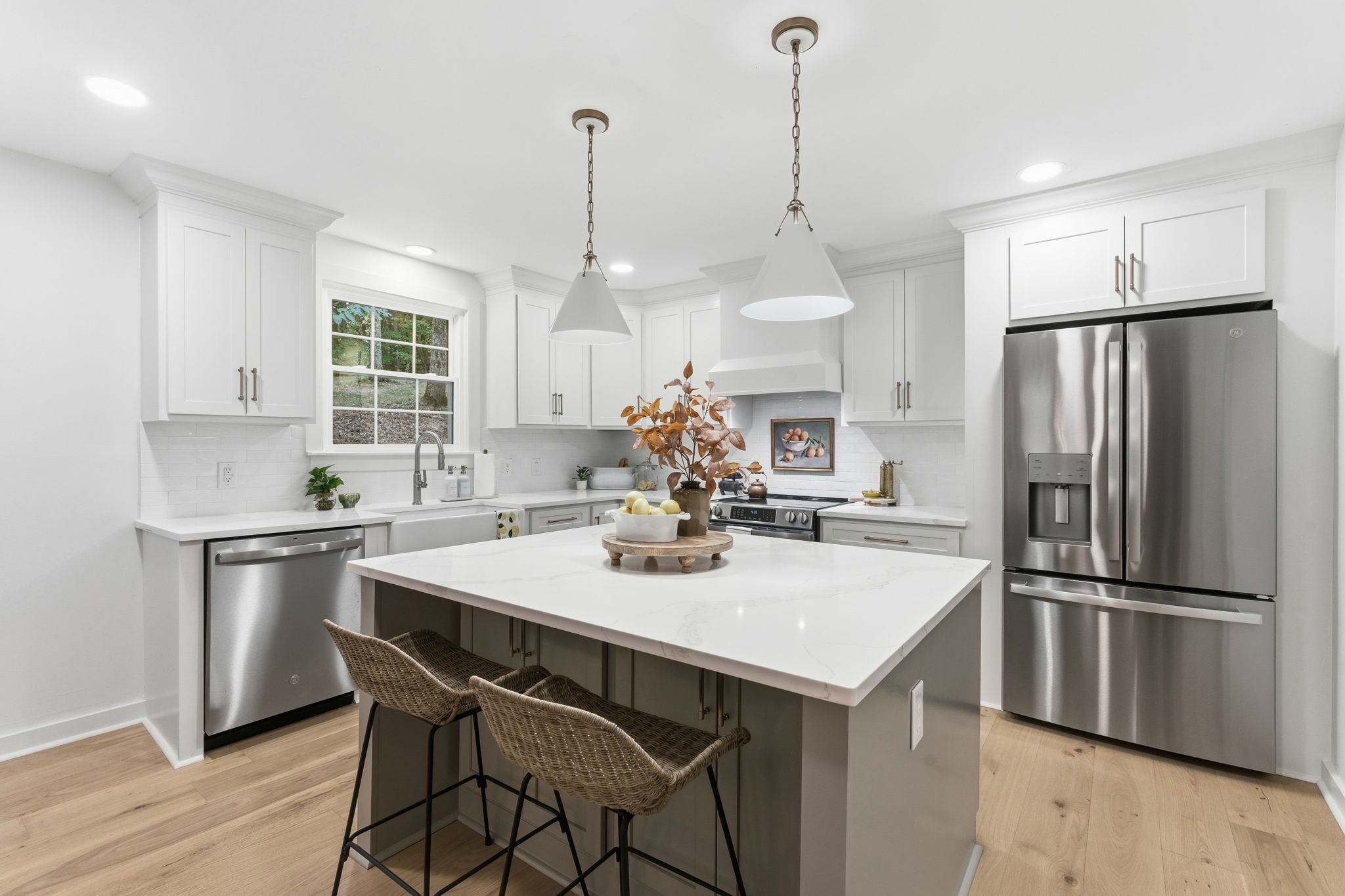 305 Ridgewood Road Franklin, TN 37064 - Photo 8 of 25 a kitchen with stainless steel appliances granite countertop a sink a stove a refrigerator and island