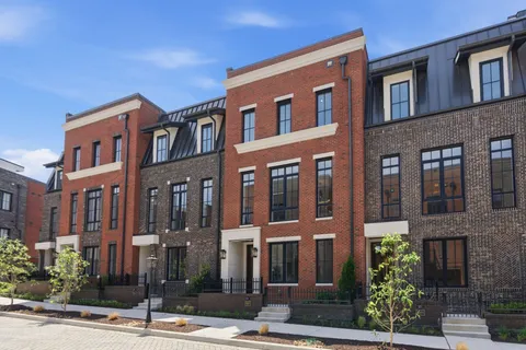 a front view of a building with street view
