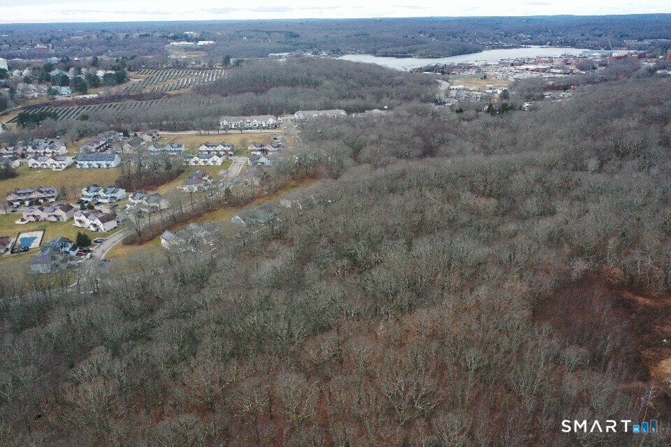 Briar Hill Road Groton, CT 06340 - Photo 14 of 17 an aerial view of town with residential houses and mountain view