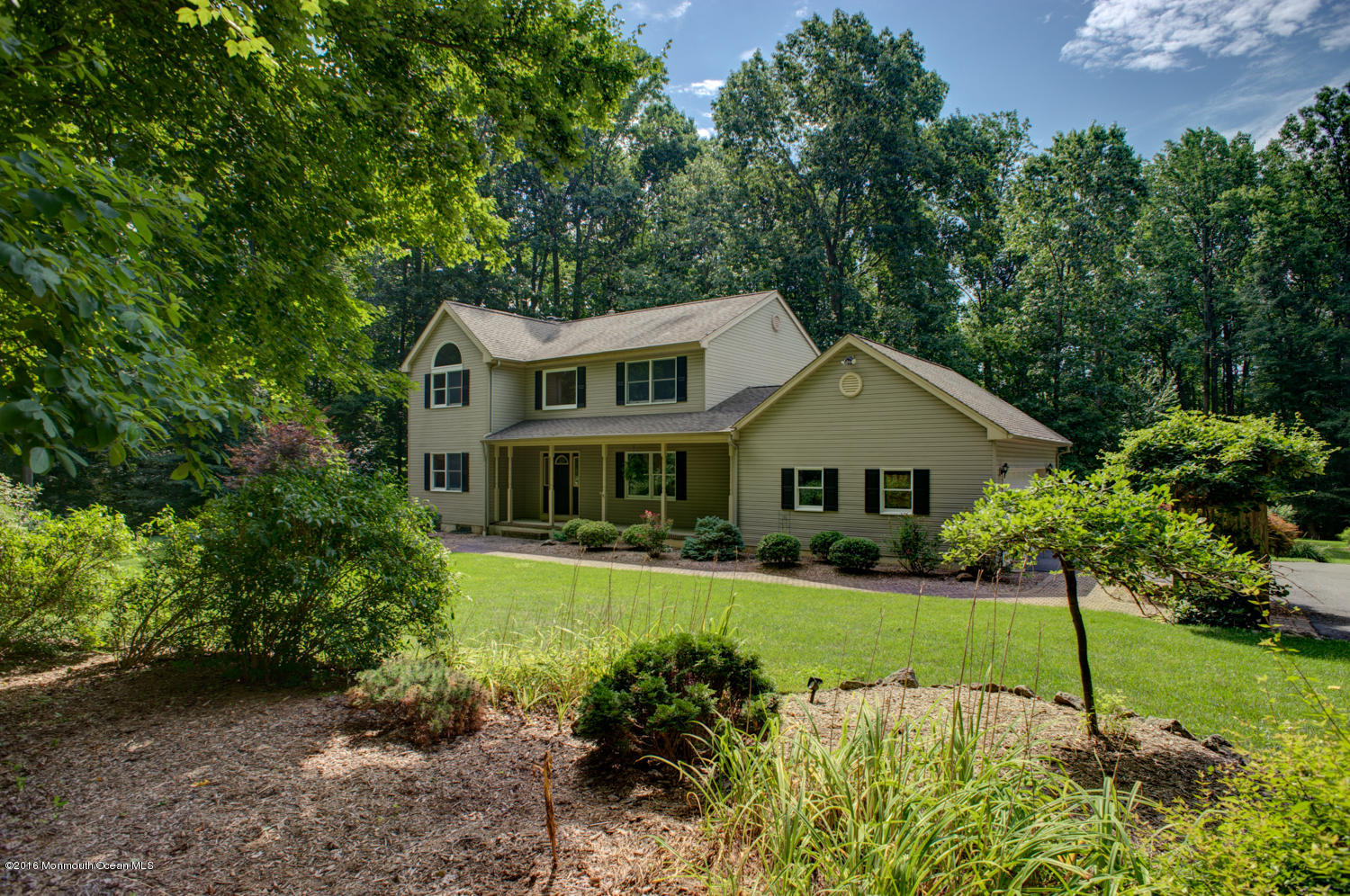23 Rues Road Cream Ridge, NJ 08514 - Photo 1 of 45 a front view of a house with a yard and trees