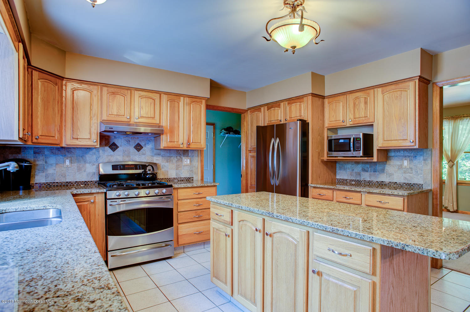 23 Rues Road Cream Ridge, NJ 08514 - Photo 13 of 45 a kitchen with stainless steel appliances granite countertop a stove a sink and a refrigerator