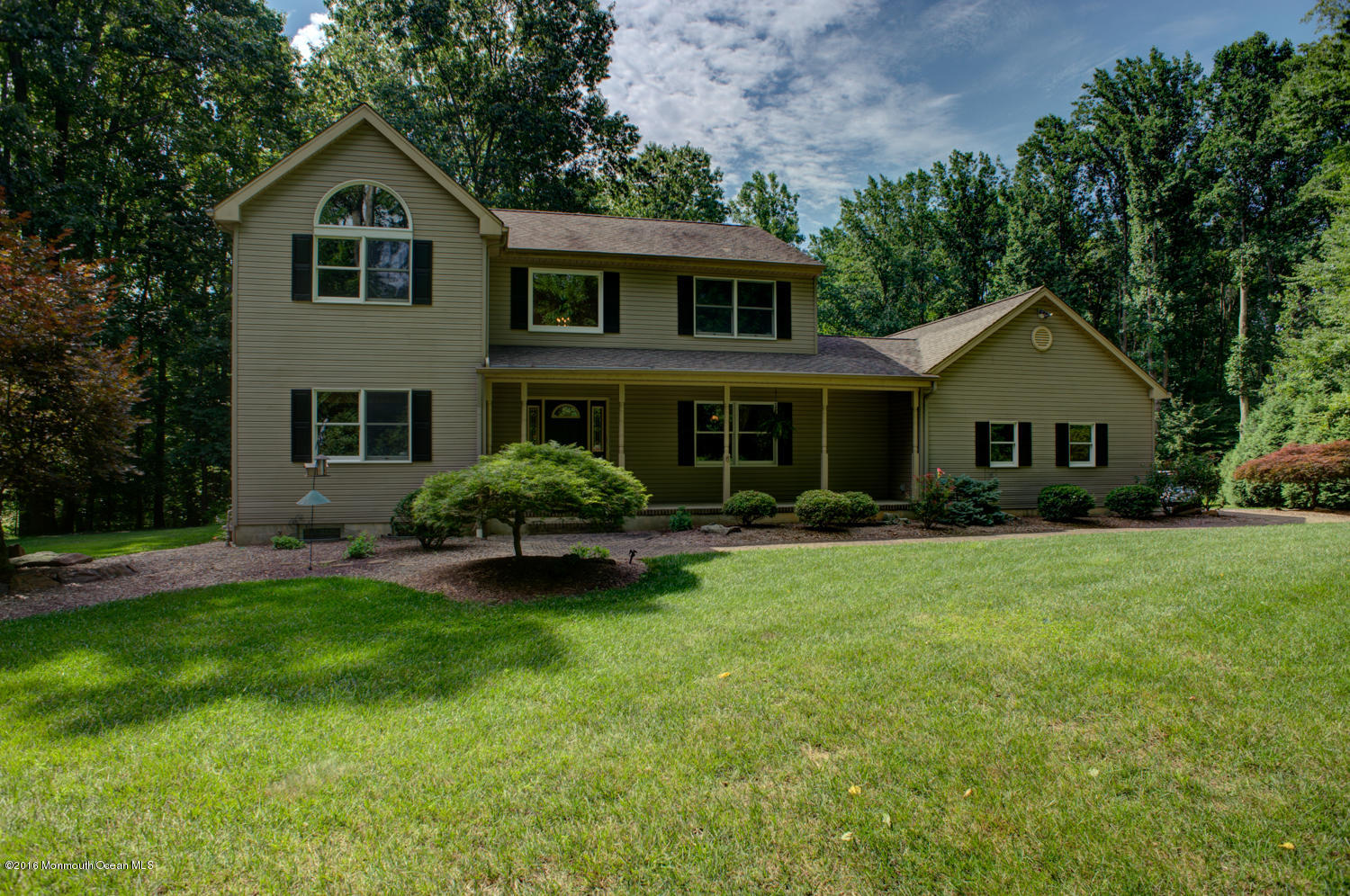 23 Rues Road Cream Ridge, NJ 08514 - Photo 3 of 45 a front view of a house with a yard and trees