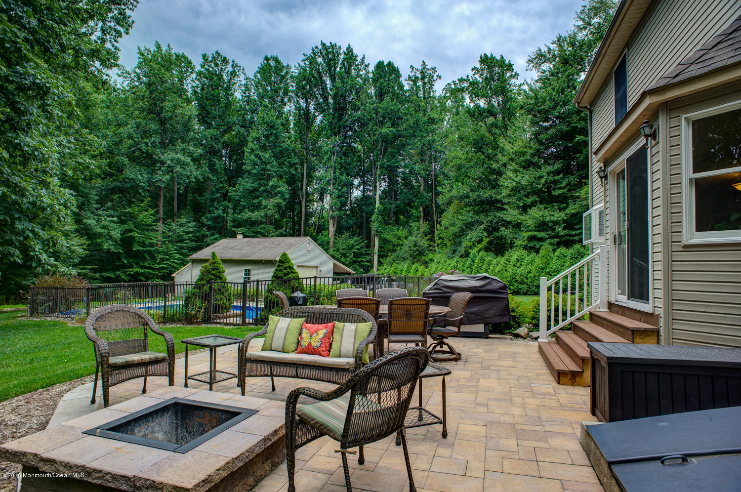 23 Rues Road Cream Ridge, NJ 08514 - Photo 36 of 45 a view of a patio with a table chairs and a backyard