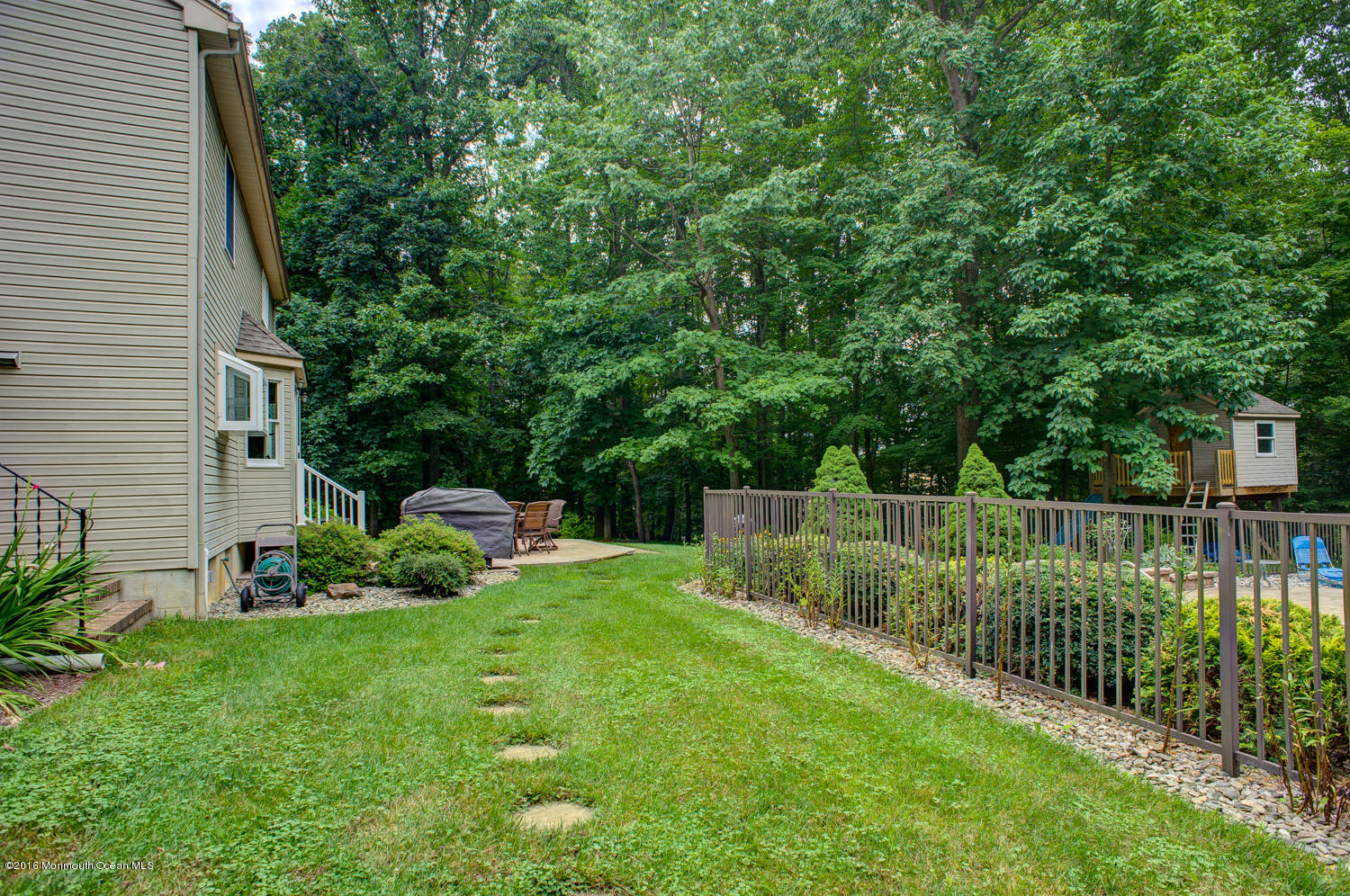 23 Rues Road Cream Ridge, NJ 08514 - Photo 42 of 45 a view of a backyard with a garden