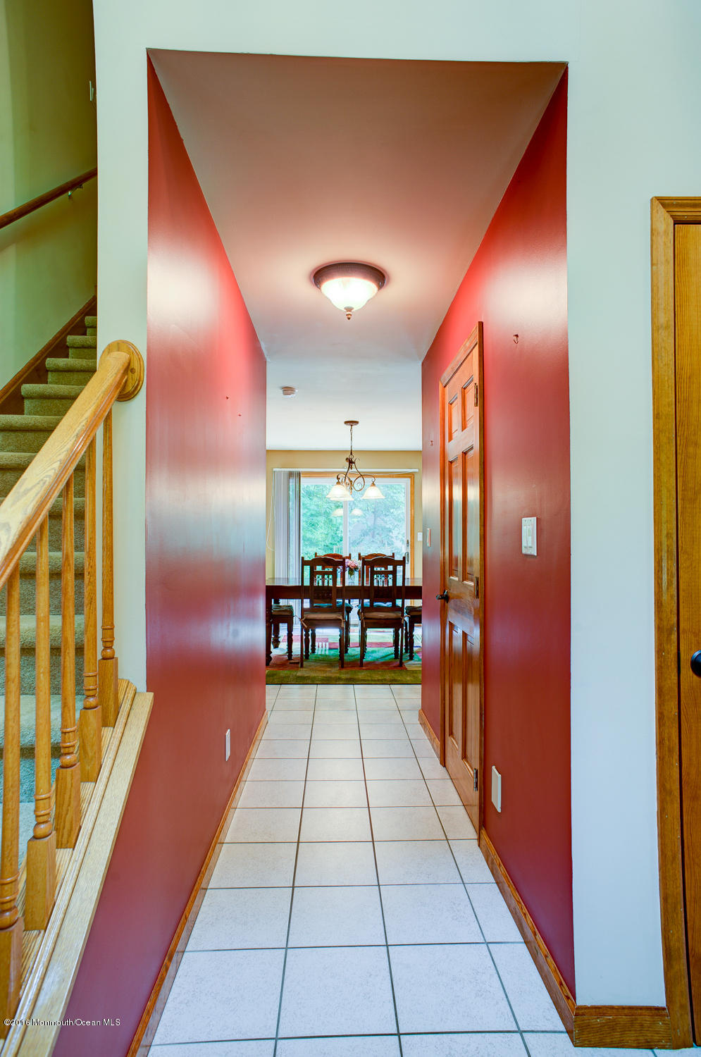 23 Rues Road Cream Ridge, NJ 08514 - Photo 6 of 45 a view of a entryway door with a couch
