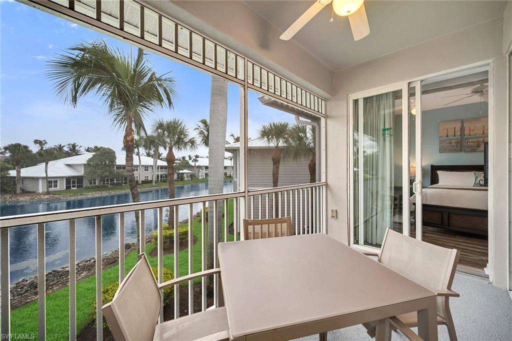 7930 Mahogany Run Lane, Unit 826 Naples, FL 34113 - Photo 27 of 50 a view of a balcony with furniture