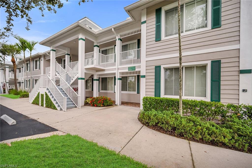 7930 Mahogany Run Lane, Unit 826 Naples, FL 34113 - Photo 31 of 50 a view of outdoor space yard and front view of a house