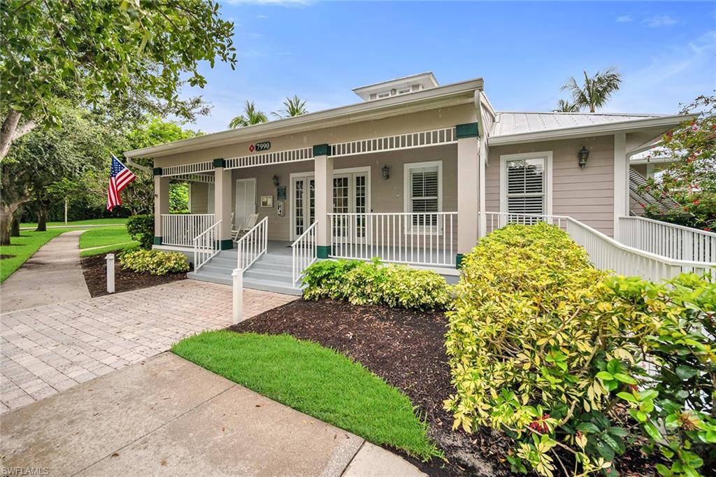 7930 Mahogany Run Lane, Unit 826 Naples, FL 34113 - Photo 34 of 50 front view of house with a yard