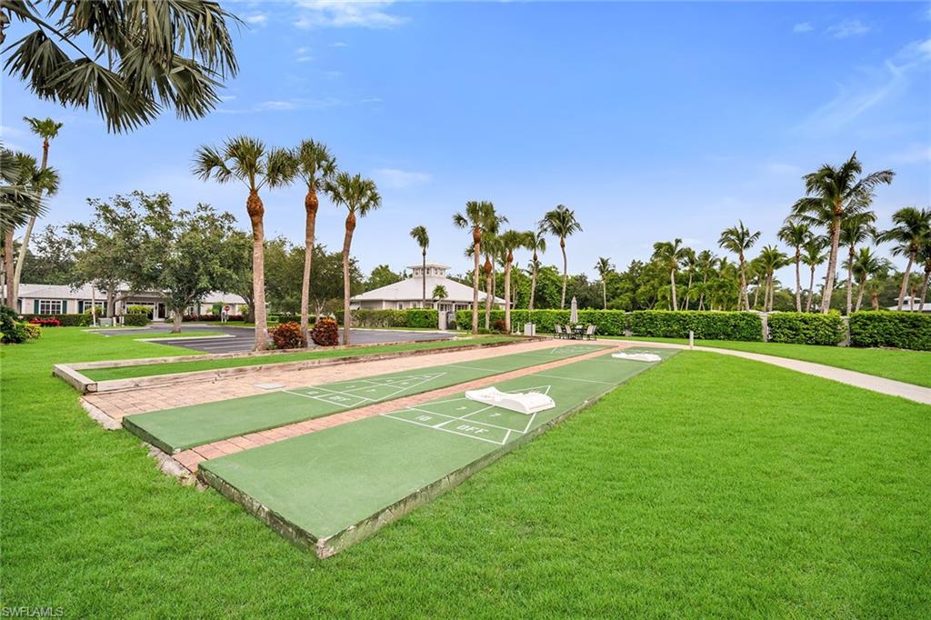 7930 Mahogany Run Lane, Unit 826 Naples, FL 34113 - Photo 35 of 50 a view of a volley ball court