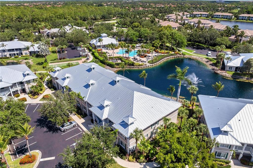 7930 Mahogany Run Lane, Unit 826 Naples, FL 34113 - Photo 39 of 50 an aerial view of residential houses with outdoor space
