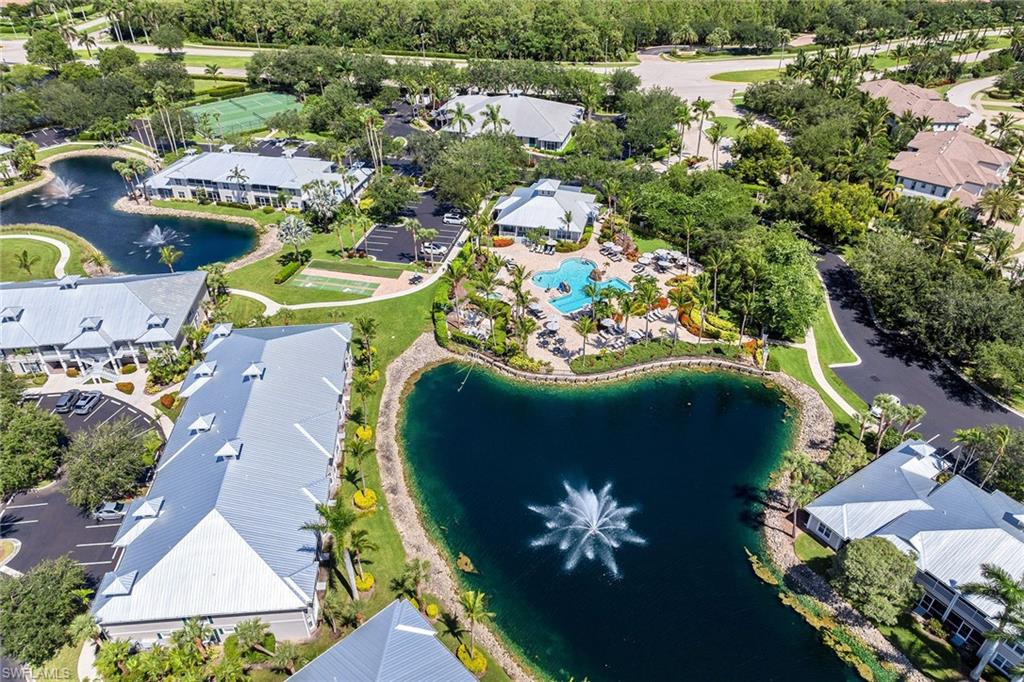 7930 Mahogany Run Lane, Unit 826 Naples, FL 34113 - Photo 40 of 50 an aerial view of a house with yard swimming pool and outdoor seating