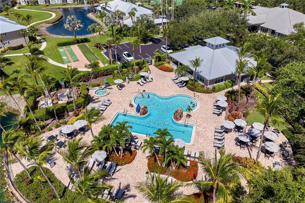 7930 Mahogany Run Lane, Unit 826 Naples, FL 34113 - Photo 41 of 50 an aerial view of residential house with outdoor space and parking