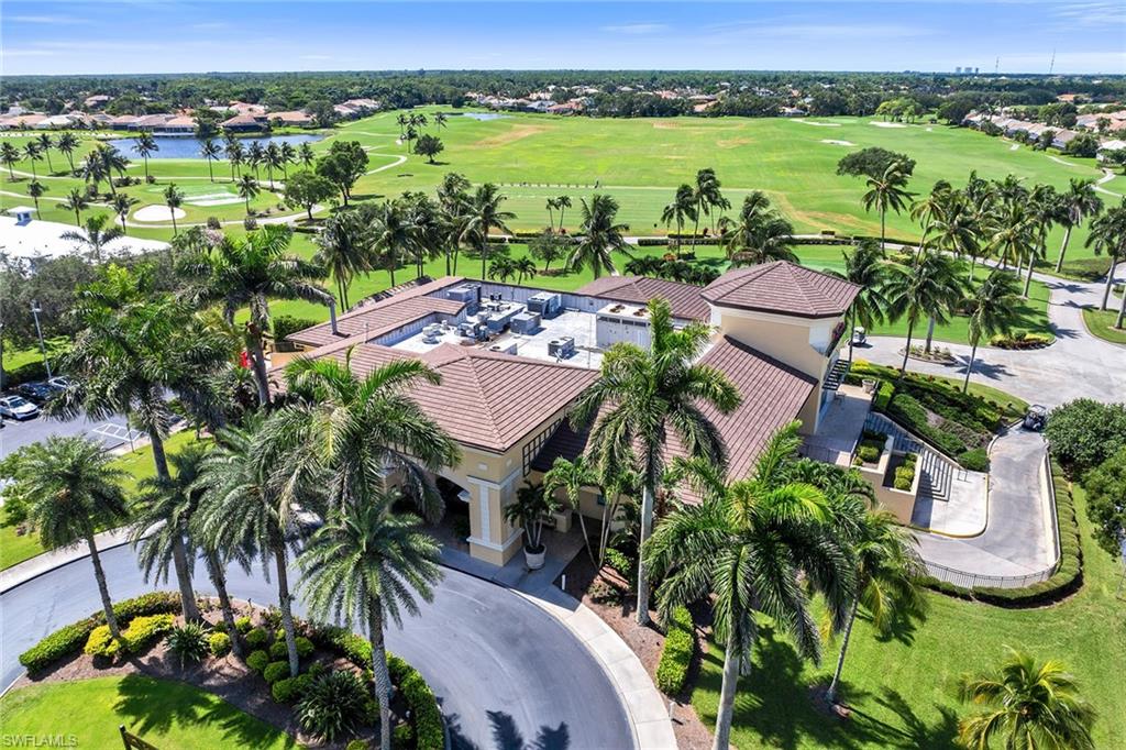 7930 Mahogany Run Lane, Unit 826 Naples, FL 34113 - Photo 45 of 50 an aerial view of residential house with outdoor space and lake view