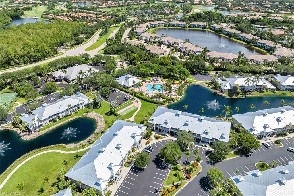 7930 Mahogany Run Lane, Unit 826 Naples, FL 34113 - Photo 47 of 50 an aerial view of residential house with outdoor space and swimming pool