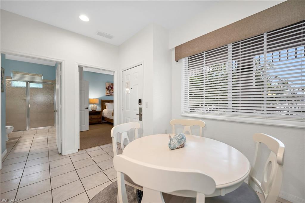 7930 Mahogany Run Lane, Unit 826 Naples, FL 34113 - Photo 7 of 50 a spacious bathroom with a sink and a bathtub