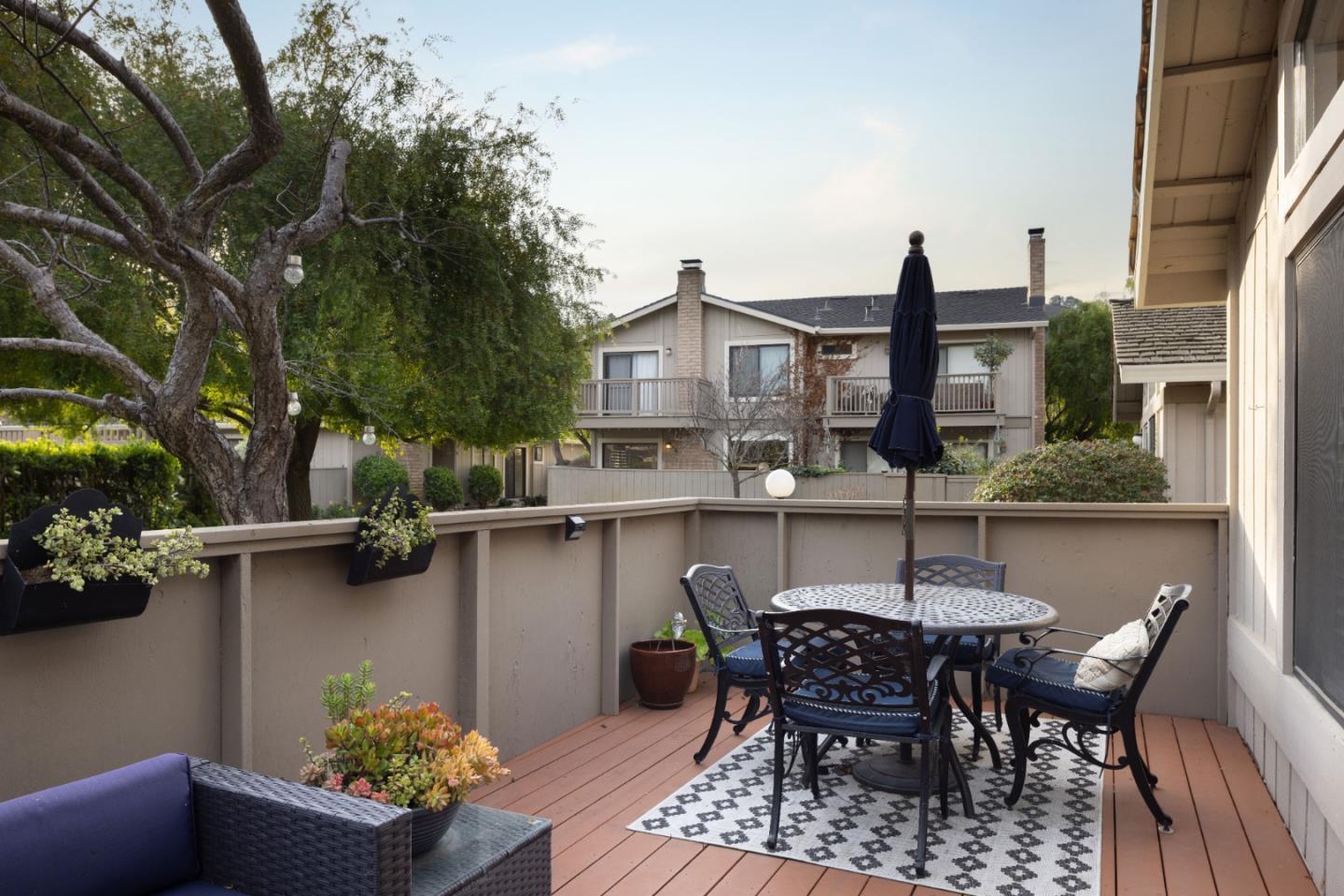 3850 Rio Road, Unit 63 Carmel, CA 93923 - Photo 6 of 19 a view of balcony with furniture and outdoor seating