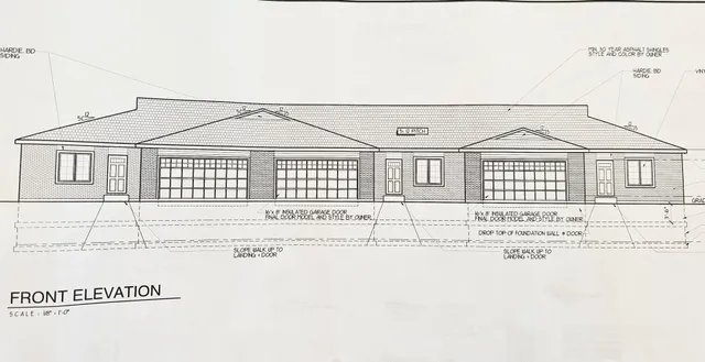 a black and white photo of a house