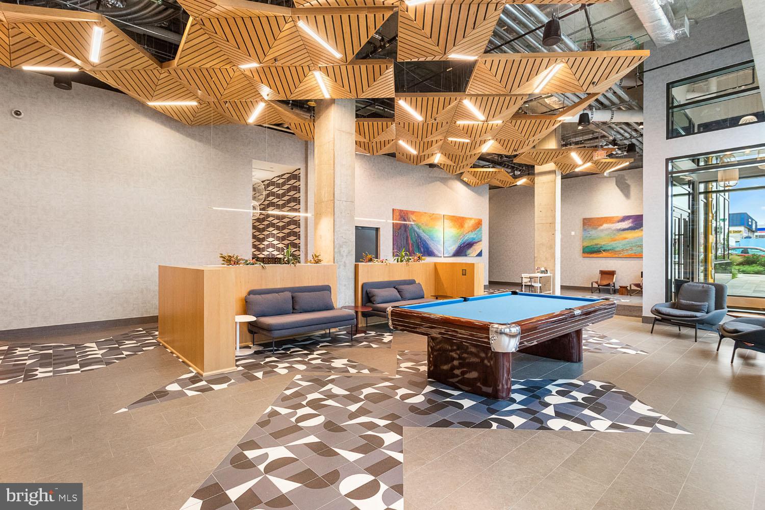 400 Florida Avenue Northeast, Unit 209 Washington, DC 20002 - Photo 4 of 31 The Lanes Lobby Pool Table