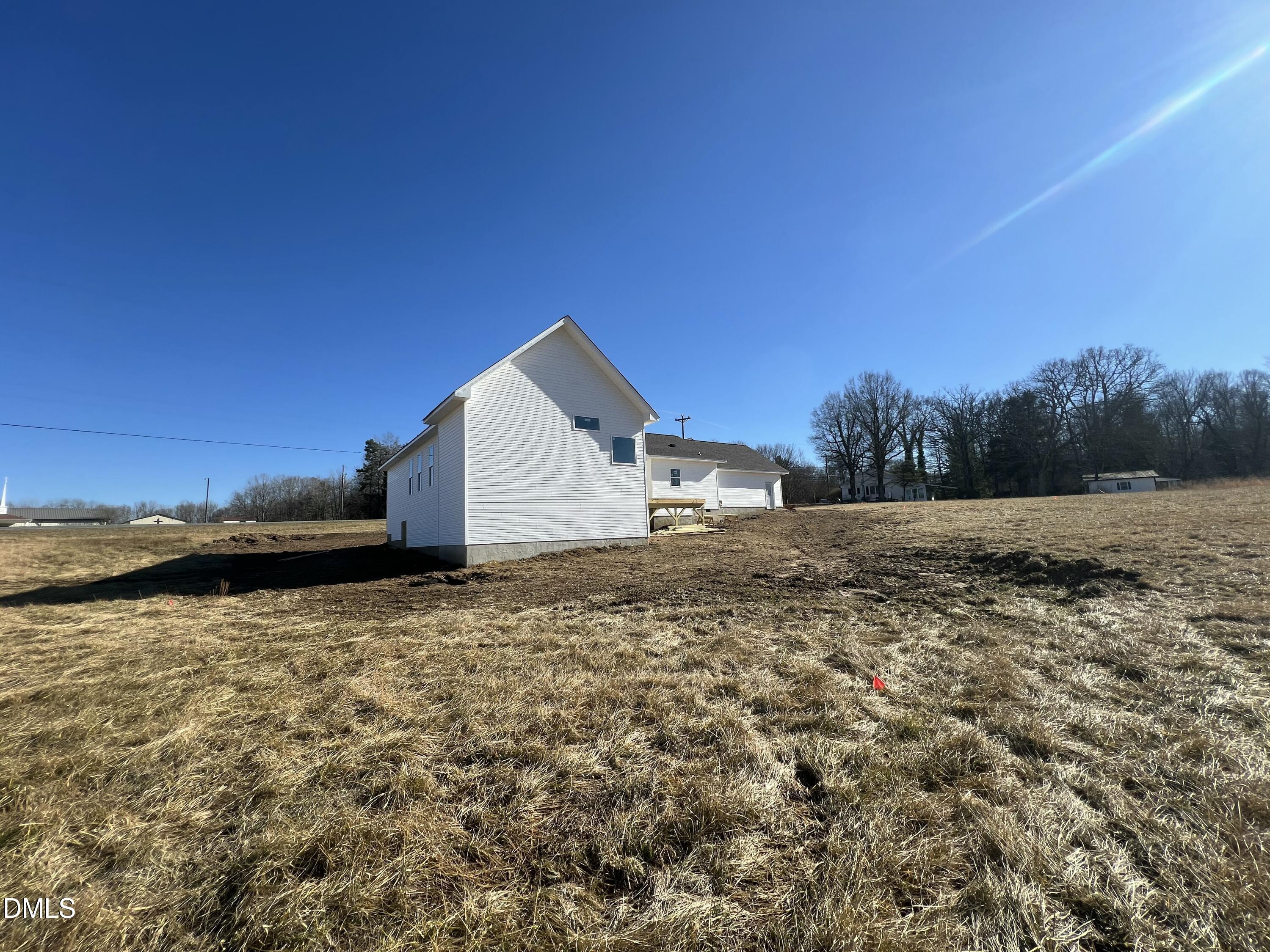 8755 Snow Camp Road Snow Camp, NC 27349 - Photo 11 of 28 a view of a dry yard with wooden fence