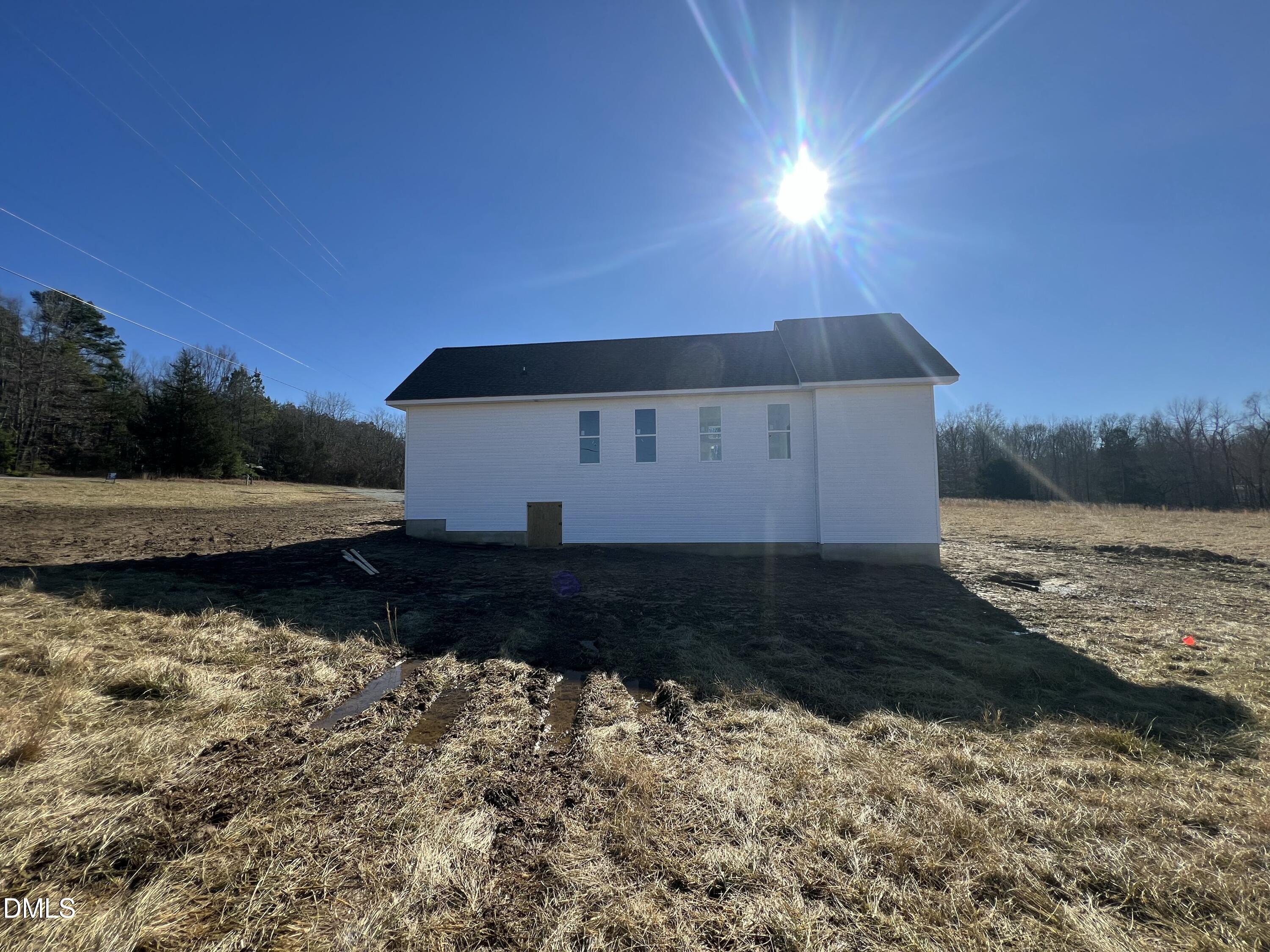 8755 Snow Camp Road Snow Camp, NC 27349 - Photo 13 of 28 a view of a lake with a yard