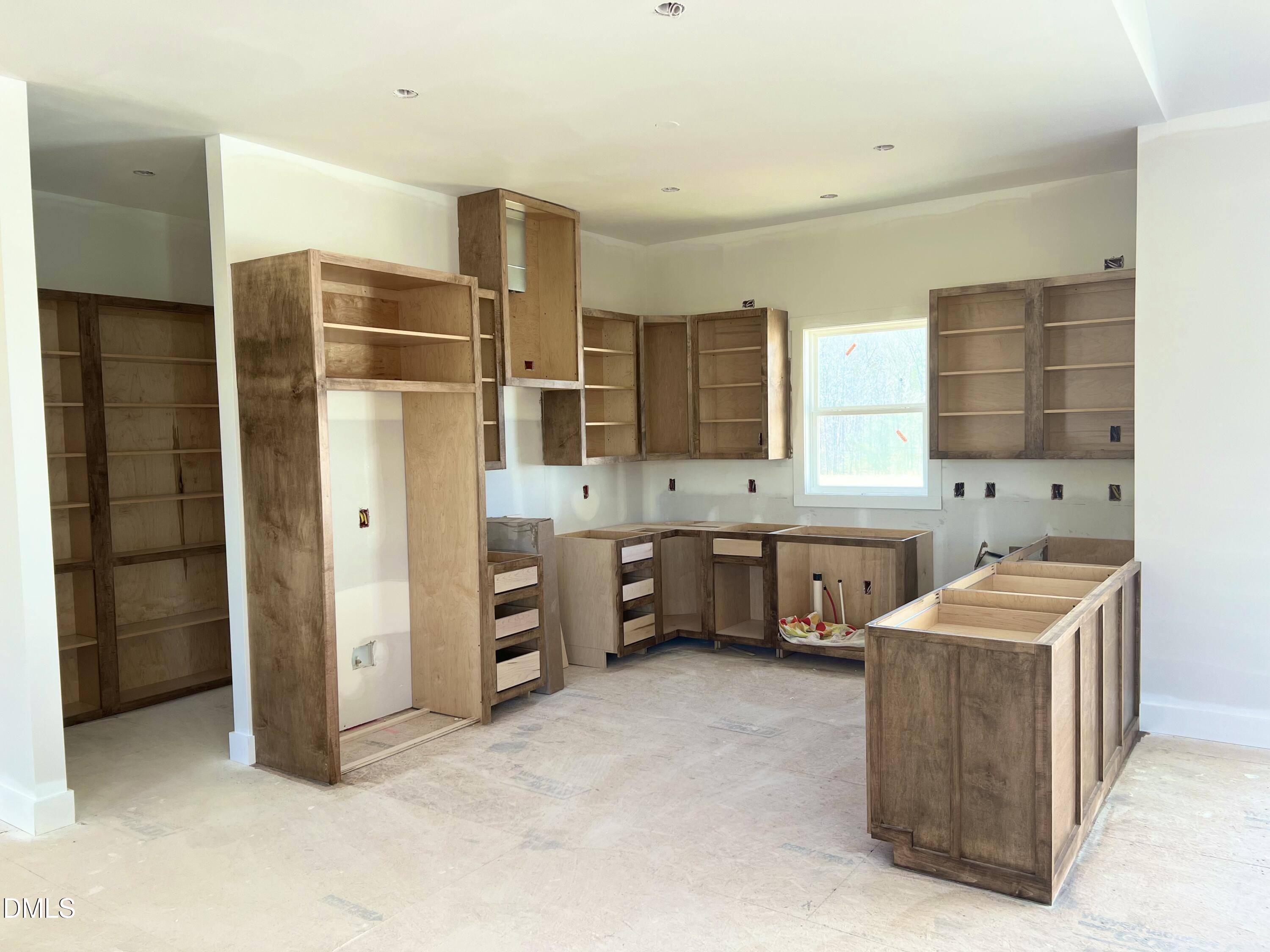 8755 Snow Camp Road Snow Camp, NC 27349 - Photo 15 of 28 a kitchen with stainless steel appliances a refrigerator and a sink
