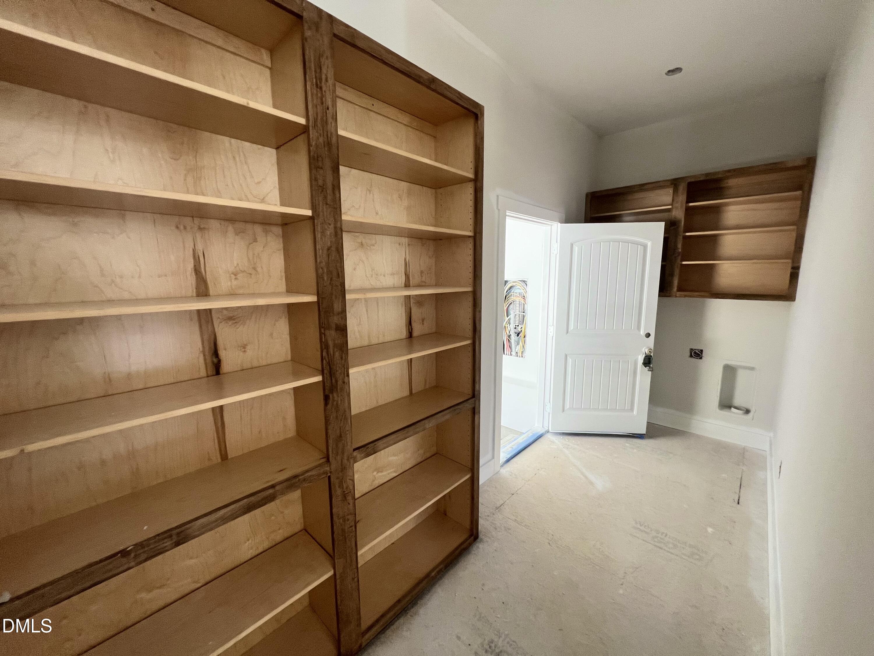 8755 Snow Camp Road Snow Camp, NC 27349 - Photo 18 of 28 a view of an empty room with empty shelves