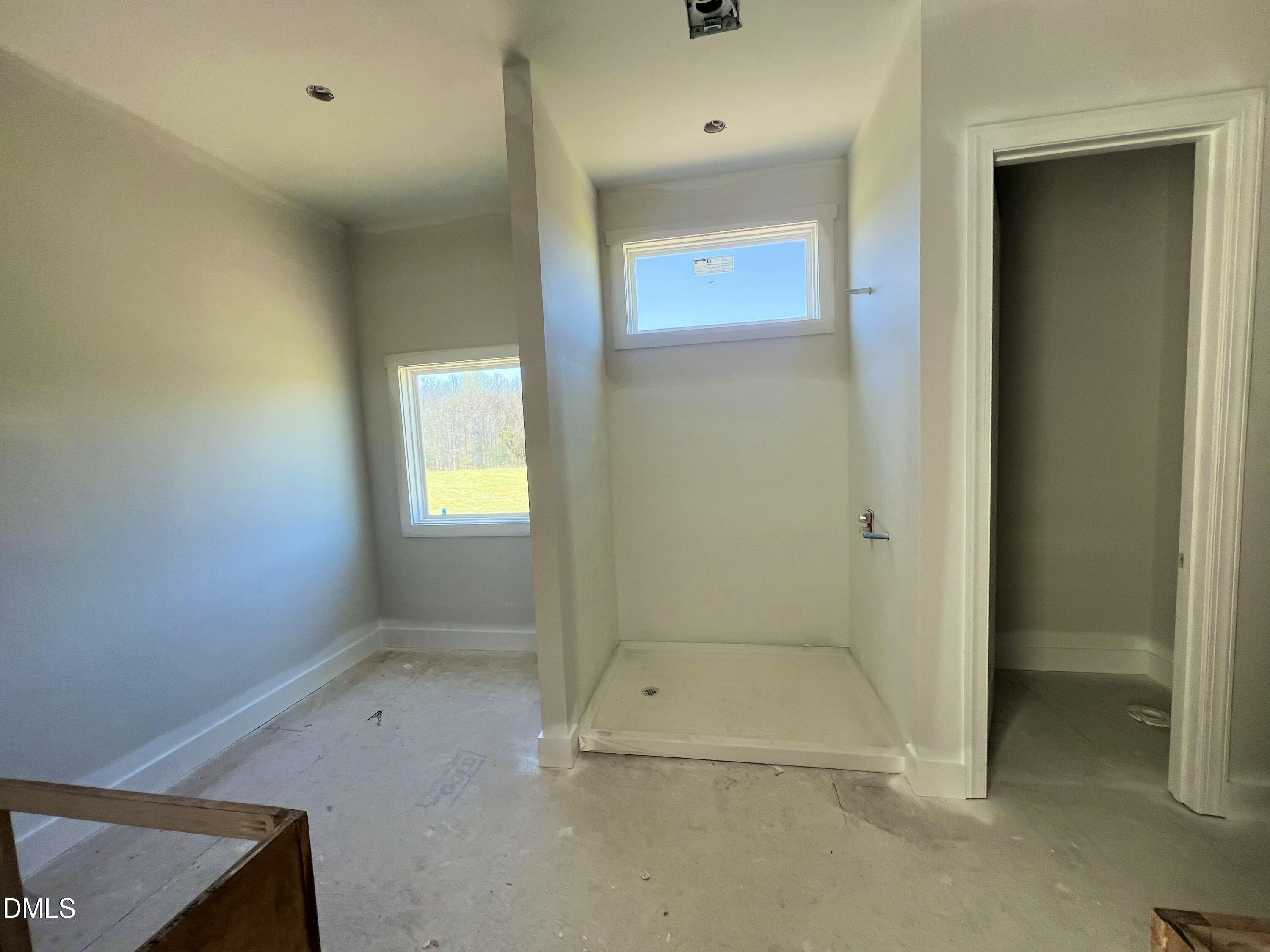 8755 Snow Camp Road Snow Camp, NC 27349 - Photo 26 of 28 a bathroom with a glass door shower