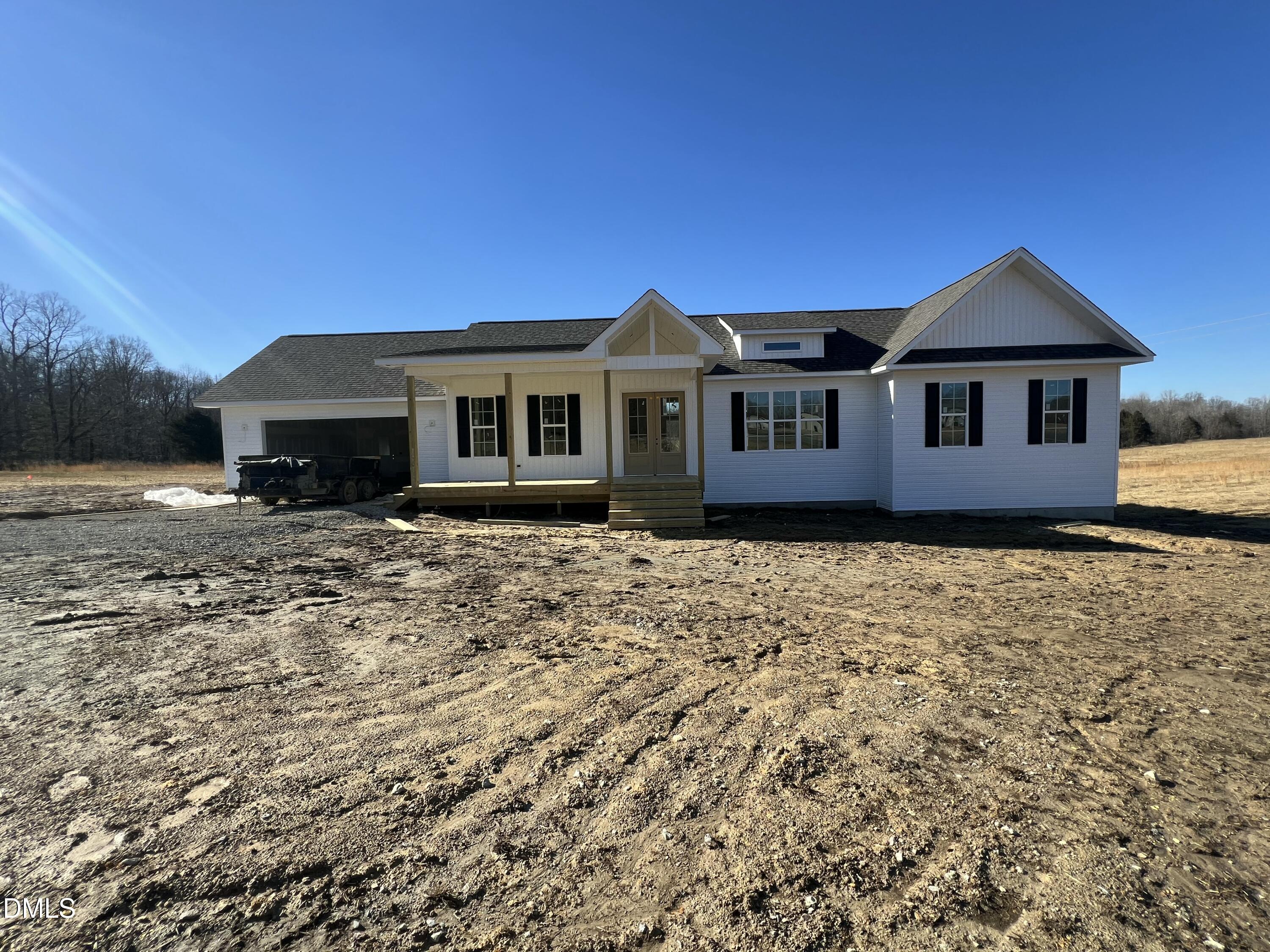 8755 Snow Camp Road Snow Camp, NC 27349 - Photo 3 of 28 a front view of a house with a yard