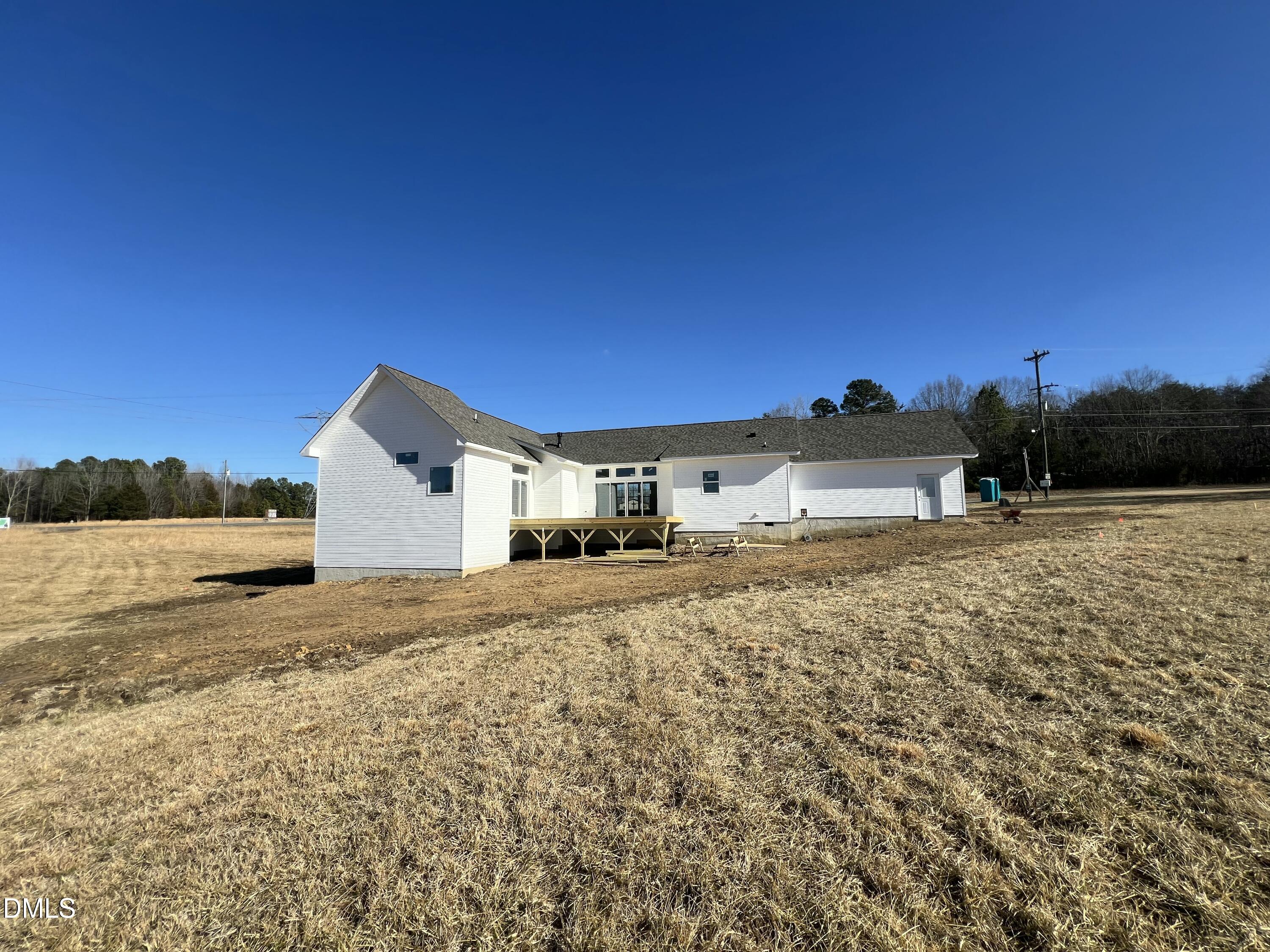 8755 Snow Camp Road Snow Camp, NC 27349 - Photo 4 of 28 a front view of a house with a yard
