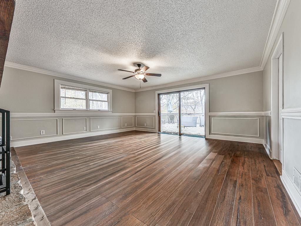 617 Crippled Oak Trail Jasper, GA 30143 - Photo 13 of 45 wooden floor in an empty room with a window