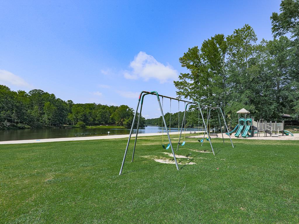 617 Crippled Oak Trail Jasper, GA 30143 - Photo 23 of 45 a swimming pool with lots of green space and fog